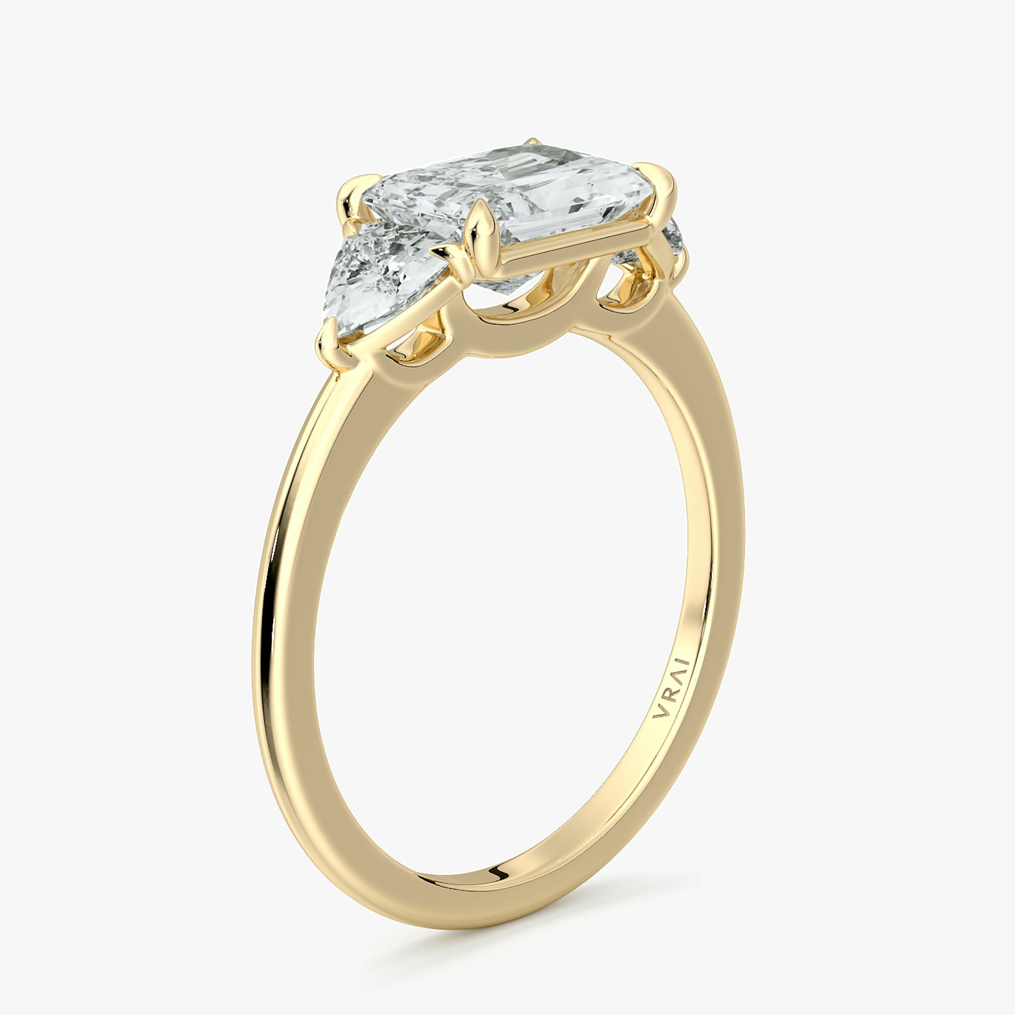 The Three Stone | Radiant | 18k | Yellow Gold | bandAccent: Plain | diamondOrientation: horizontal | sideStoneCarat: 0.25ct | sideStoneShape: Trillion | caratWeight: other