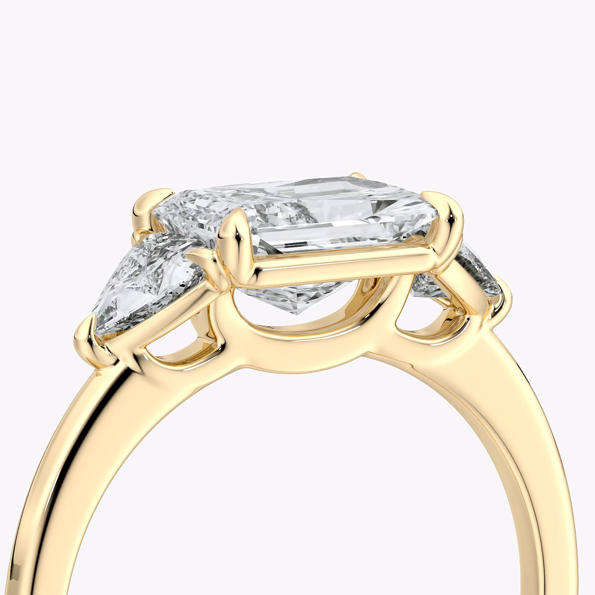 The Three Stone | Radiant | 18k | Yellow Gold | bandAccent: Plain | diamondOrientation: horizontal | sideStoneCarat: 0.25ct | sideStoneShape: Trillion | caratWeight: other