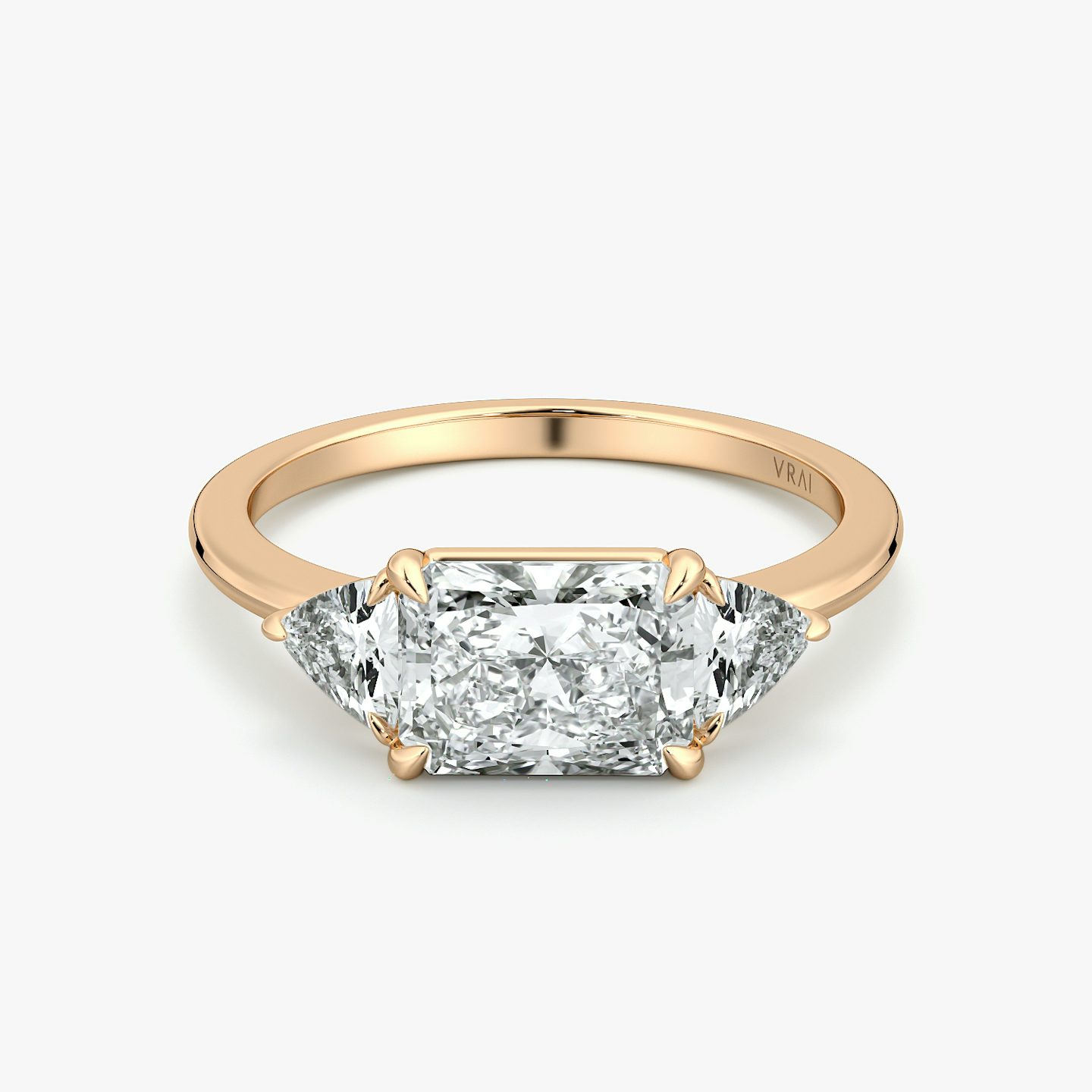 The Three Stone | Radiant | 14k | Rose Gold | bandAccent: Plain | diamondOrientation: horizontal | sideStoneCarat: 0.25ct | sideStoneShape: Trillion | caratWeight: other