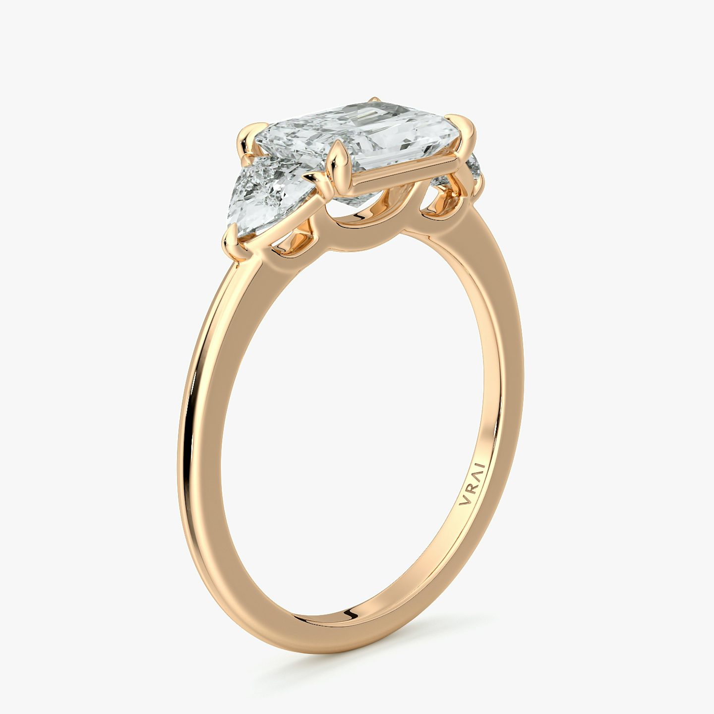 The Three Stone | Radiant | 14k | Rose Gold | bandAccent: Plain | diamondOrientation: horizontal | sideStoneCarat: 0.25ct | sideStoneShape: Trillion | caratWeight: other