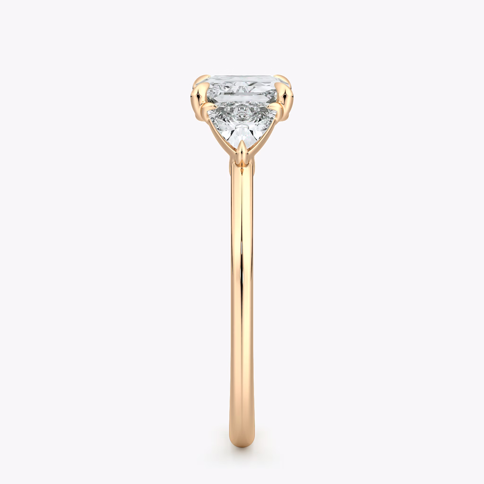 The Three Stone | Radiant | 14k | Rose Gold | bandAccent: Plain | diamondOrientation: horizontal | sideStoneCarat: 0.25ct | sideStoneShape: Trillion | caratWeight: other