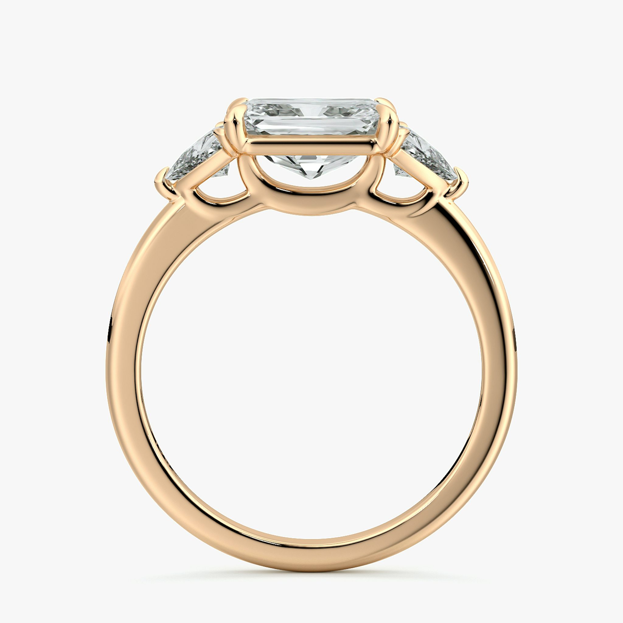 The Three Stone | Radiant | 14k | Rose Gold | bandAccent: Plain | diamondOrientation: horizontal | sideStoneCarat: 0.25ct | sideStoneShape: Trillion | caratWeight: other