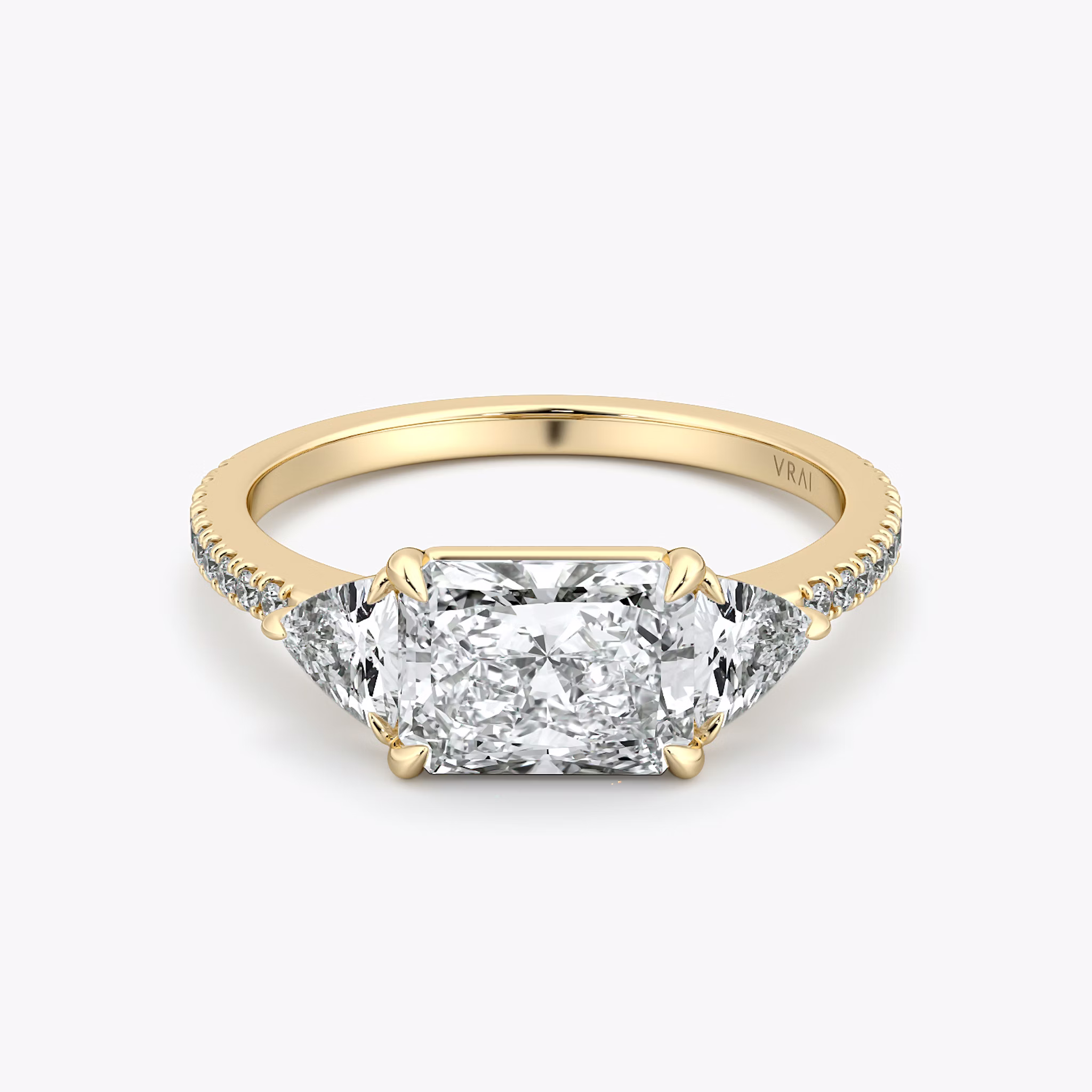 The Three Stone | Radiant | 18k | Yellow Gold | bandAccent: Pavé | diamondOrientation: horizontal | sideStoneCarat: 0.25ct | sideStoneShape: Trillion | caratWeight: other