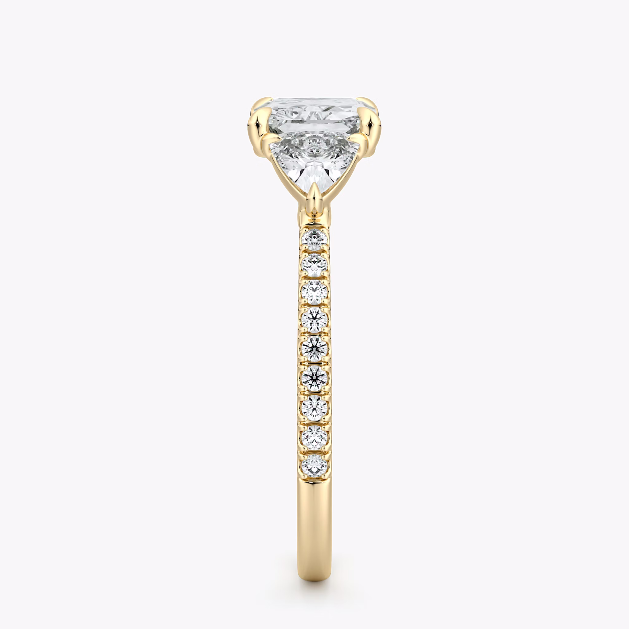 The Three Stone | Radiant | 18k | Yellow Gold | bandAccent: Pavé | diamondOrientation: horizontal | sideStoneCarat: 0.25ct | sideStoneShape: Trillion | caratWeight: other