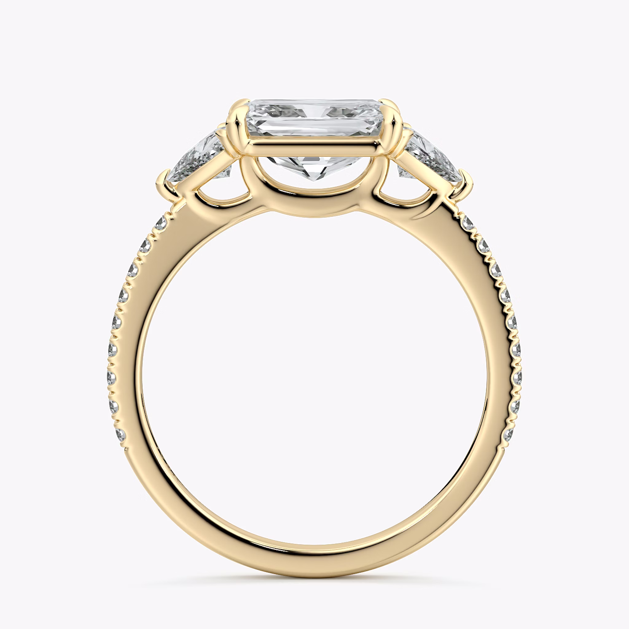 The Three Stone | Radiant | 18k | Yellow Gold | bandAccent: Pavé | diamondOrientation: horizontal | sideStoneCarat: 0.25ct | sideStoneShape: Trillion | caratWeight: other