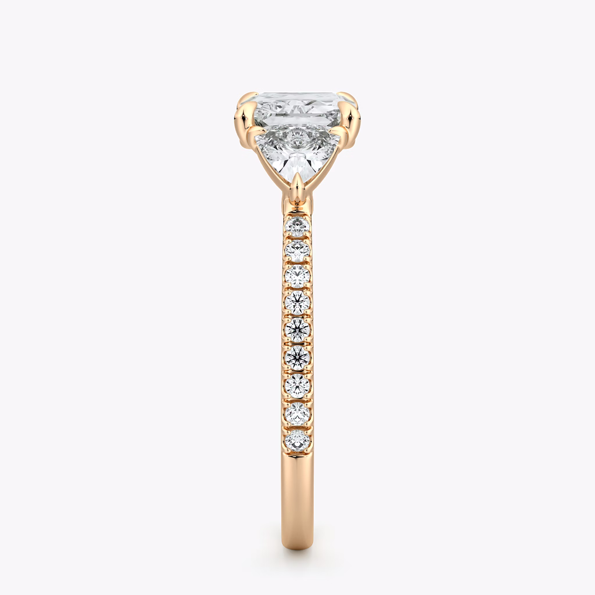 The Three Stone | Radiant | 14k | Rose Gold | bandAccent: Pavé | diamondOrientation: horizontal | sideStoneCarat: 0.25ct | sideStoneShape: Trillion | caratWeight: other