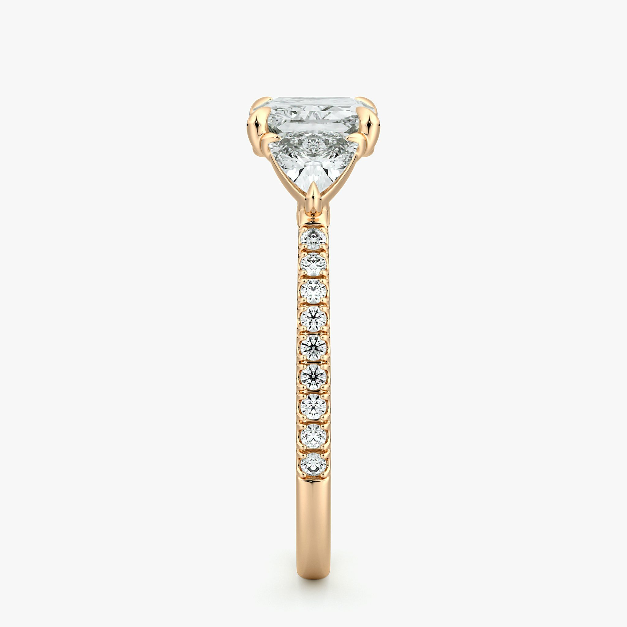 The Three Stone | Radiant | 14k | Rose Gold | bandAccent: Pavé | diamondOrientation: horizontal | sideStoneCarat: 0.25ct | sideStoneShape: Trillion | caratWeight: other