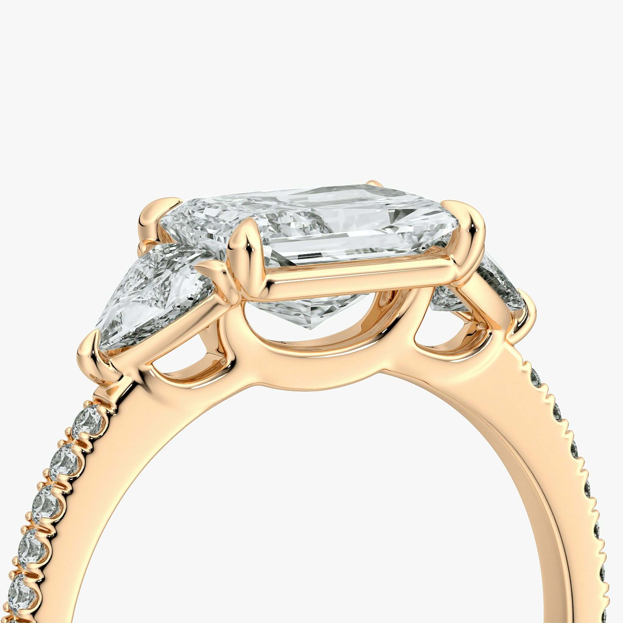 The Three Stone | Radiant | 14k | Rose Gold | bandAccent: Pavé | diamondOrientation: horizontal | sideStoneCarat: 0.25ct | sideStoneShape: Trillion | caratWeight: other