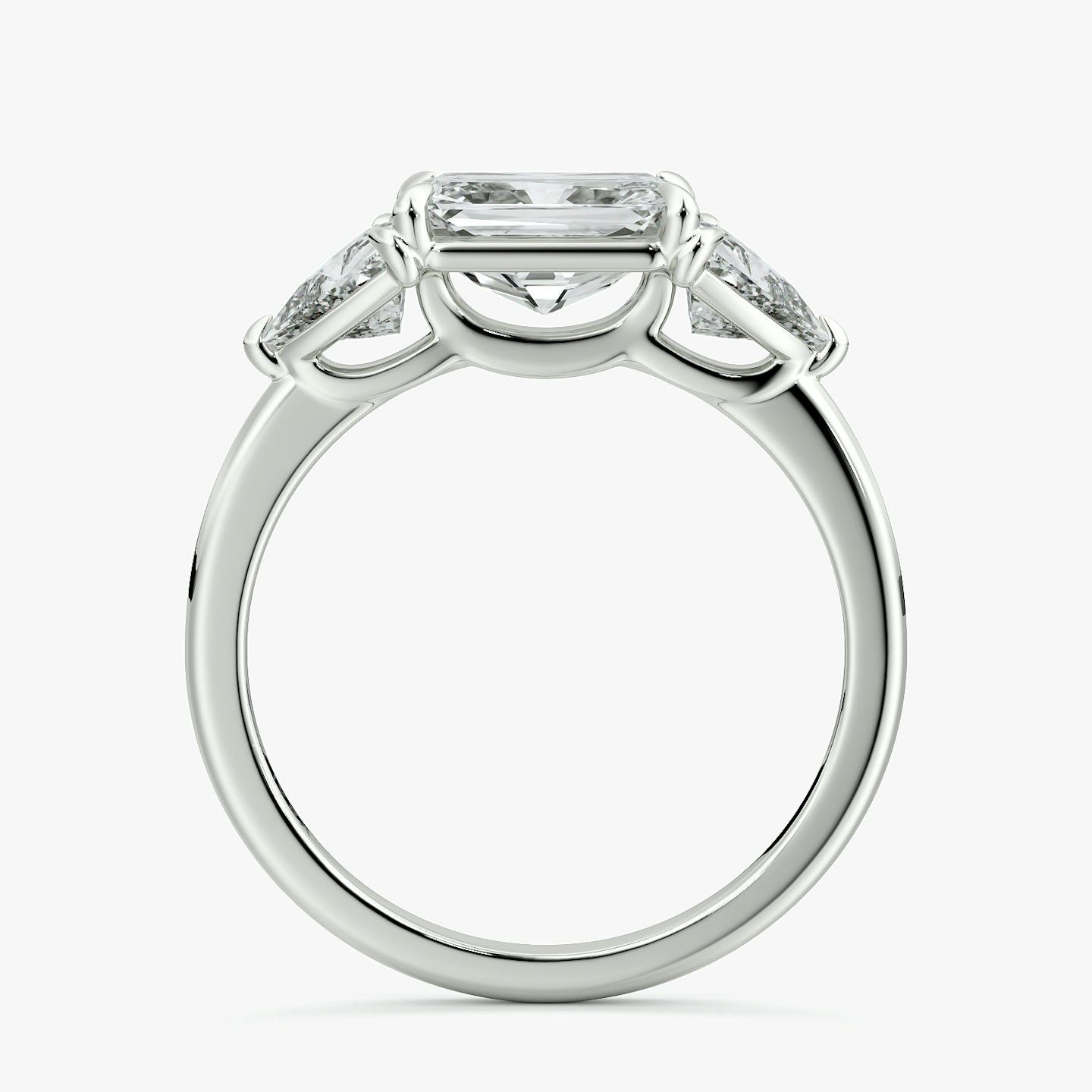 The Three Stone | Radiant | 18k | White Gold | bandAccent: Plain | diamondOrientation: horizontal | sideStoneCarat: 0.50ct | sideStoneShape: Trillion | caratWeight: other