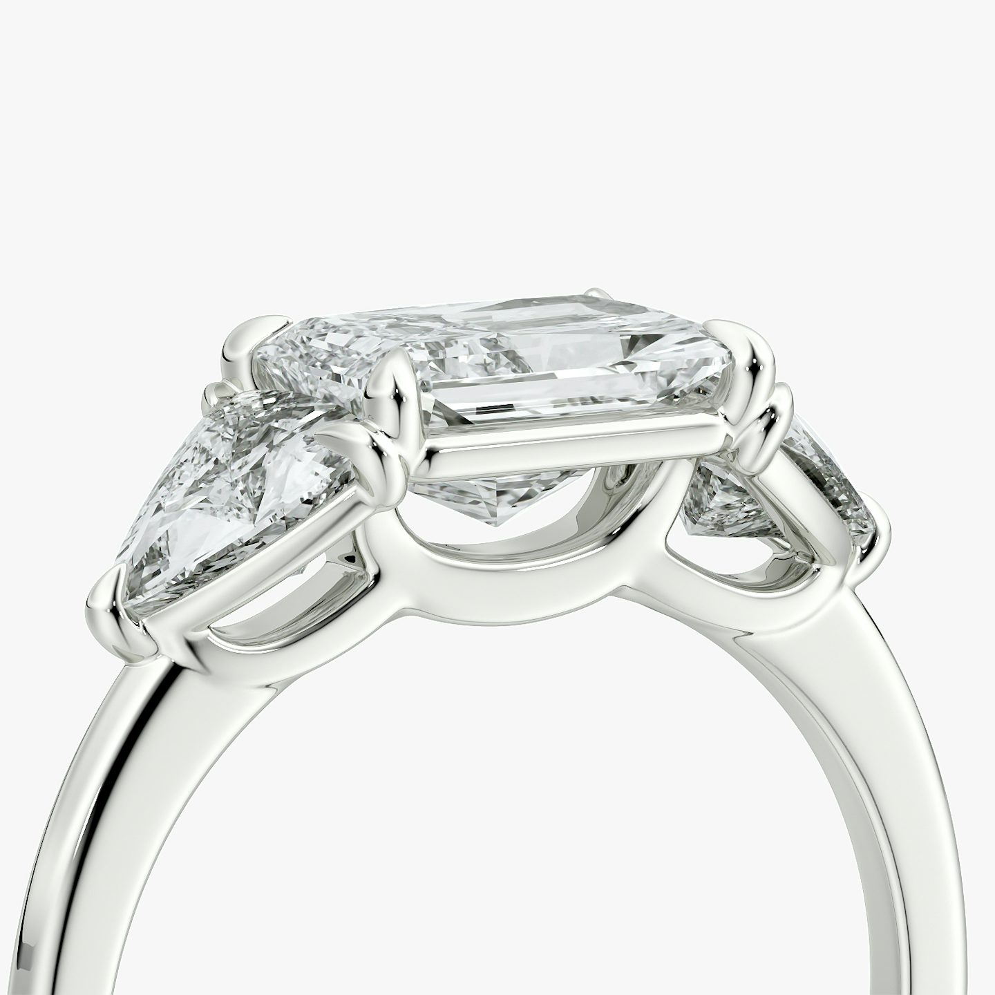 The Three Stone | Radiant | 18k | White Gold | bandAccent: Plain | diamondOrientation: horizontal | sideStoneCarat: 0.50ct | sideStoneShape: Trillion | caratWeight: other