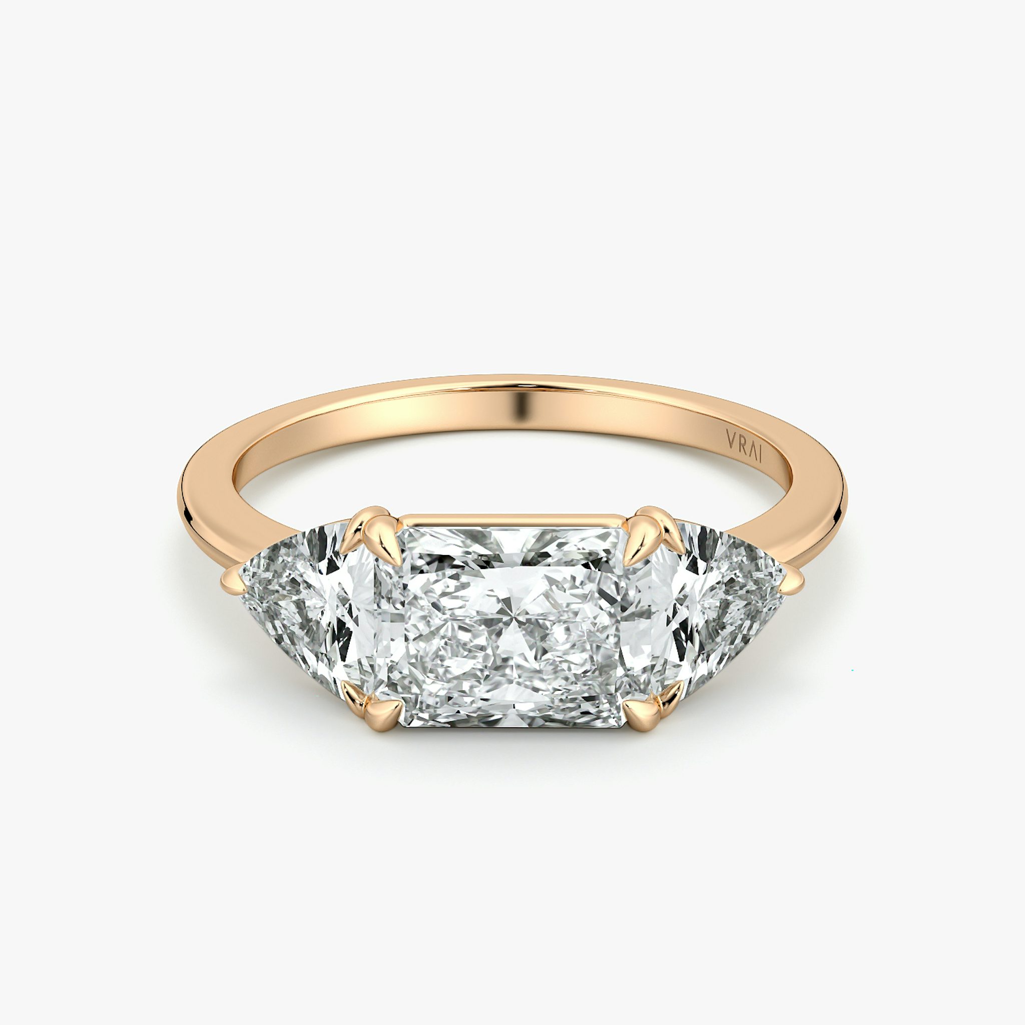 The Three Stone | Radiant | 14k | Rose Gold | bandAccent: Plain | diamondOrientation: horizontal | sideStoneCarat: 0.50ct | sideStoneShape: Trillion | caratWeight: other