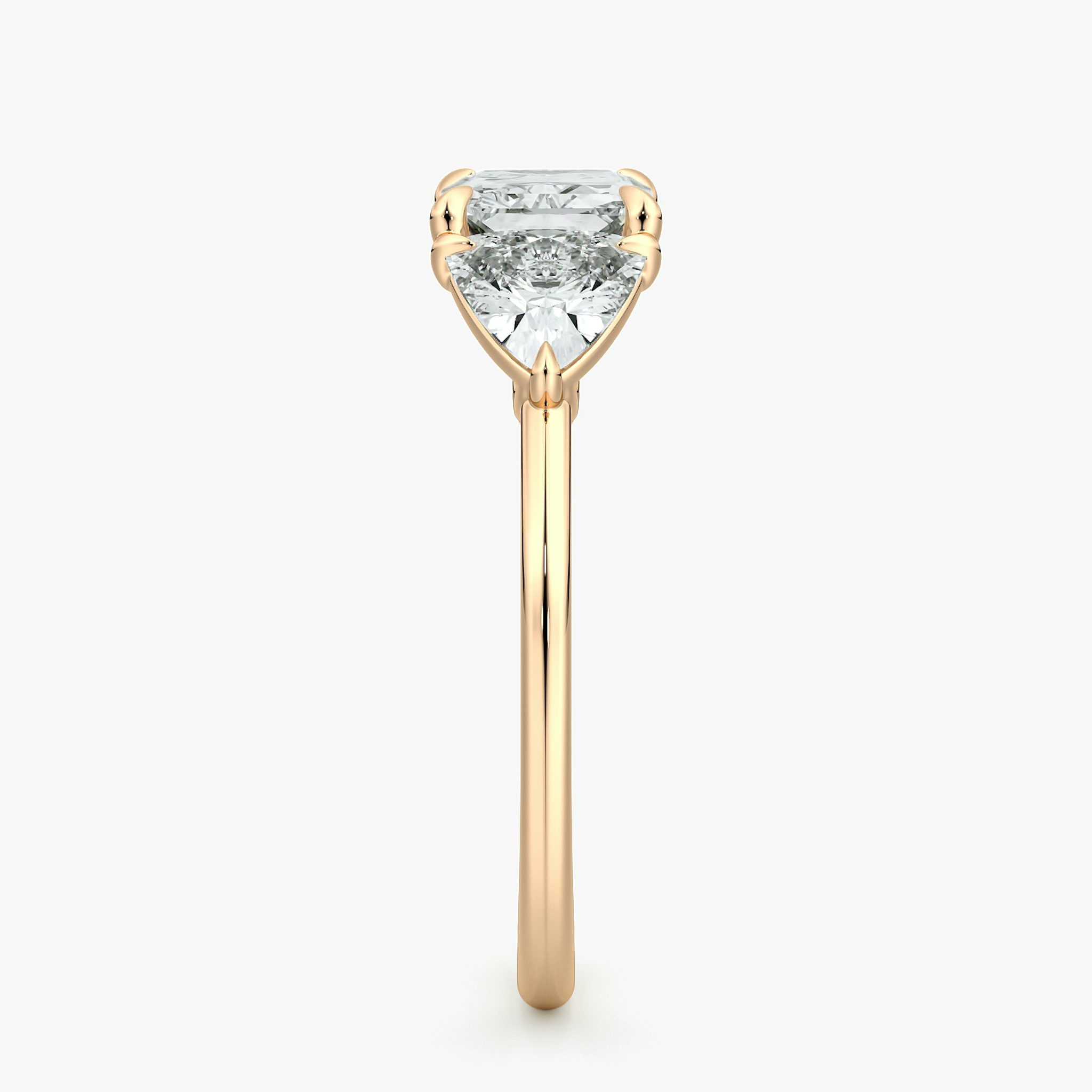 The Three Stone | Radiant | 14k | Rose Gold | bandAccent: Plain | diamondOrientation: horizontal | sideStoneCarat: 0.50ct | sideStoneShape: Trillion | caratWeight: other