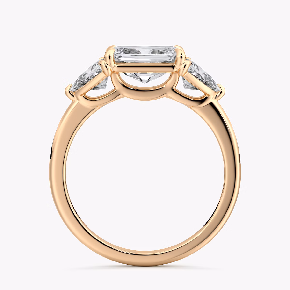 The Three Stone | Radiant | 14k | Rose Gold | bandAccent: Plain | diamondOrientation: horizontal | sideStoneCarat: 0.50ct | sideStoneShape: Trillion | caratWeight: other