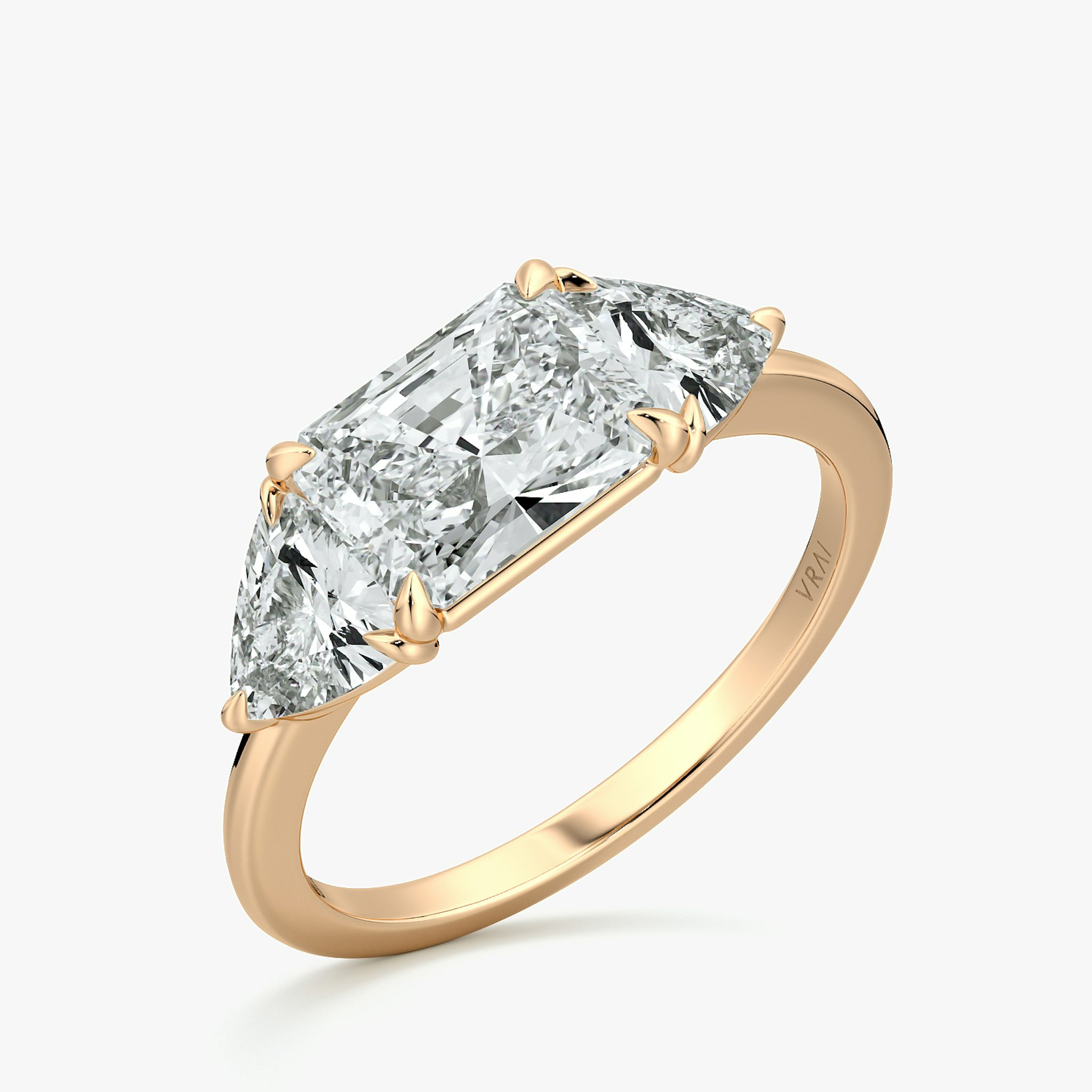 The Three Stone | Radiant | 14k | Rose Gold | bandAccent: Plain | diamondOrientation: horizontal | sideStoneCarat: 0.50ct | sideStoneShape: Trillion | caratWeight: other