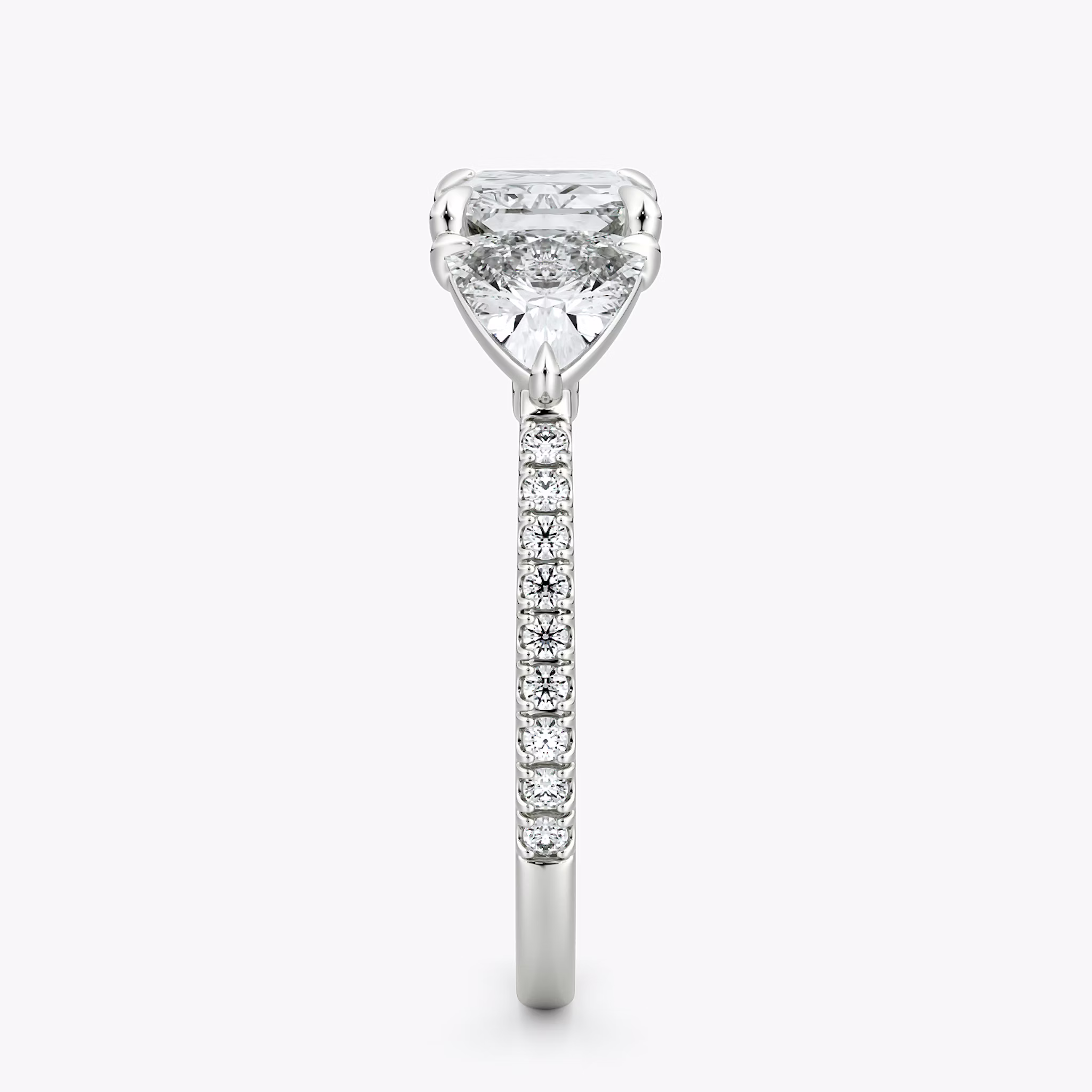 The Three Stone | Radiant | 18k | White Gold | bandAccent: Pavé | diamondOrientation: horizontal | sideStoneCarat: 0.50ct | sideStoneShape: Trillion | caratWeight: other