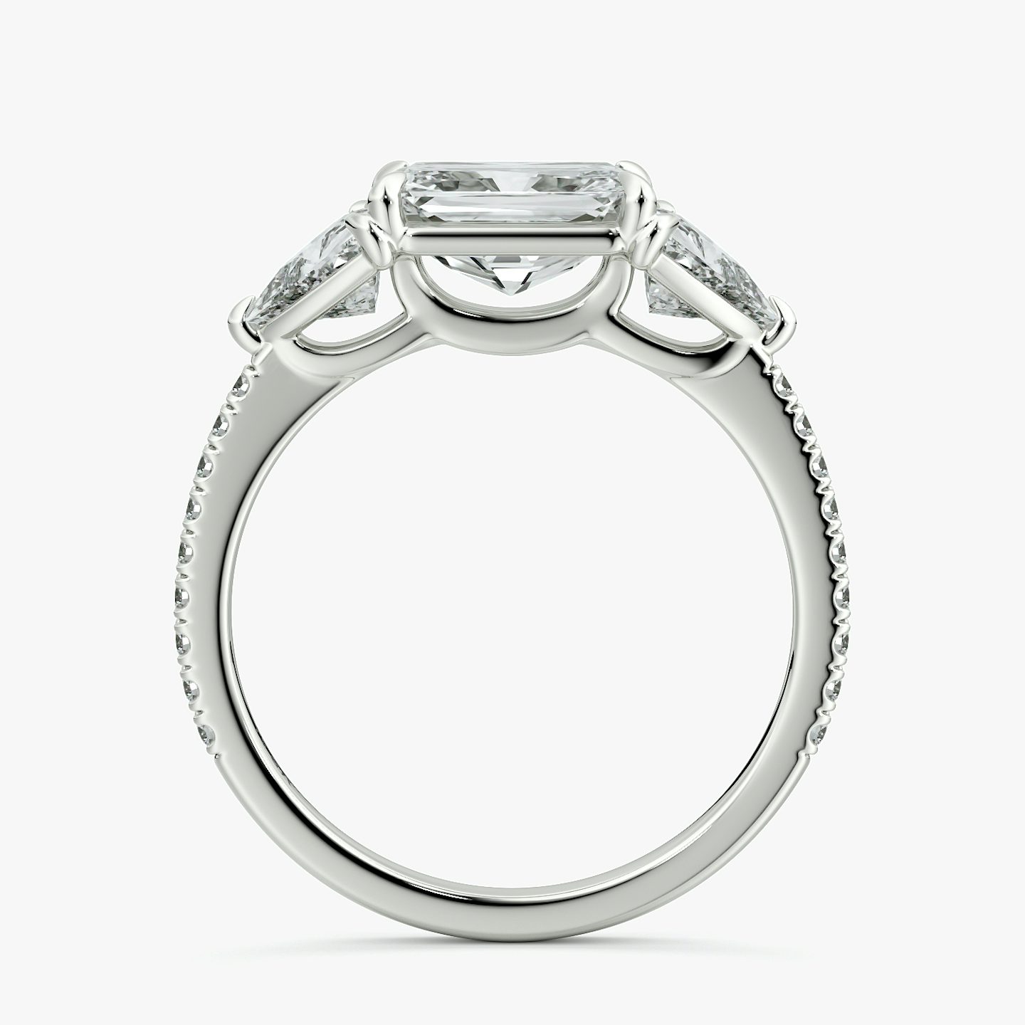 The Three Stone | Radiant | Platinum | bandAccent: Pavé | diamondOrientation: horizontal | sideStoneCarat: 0.50ct | sideStoneShape: Trillion | caratWeight: other