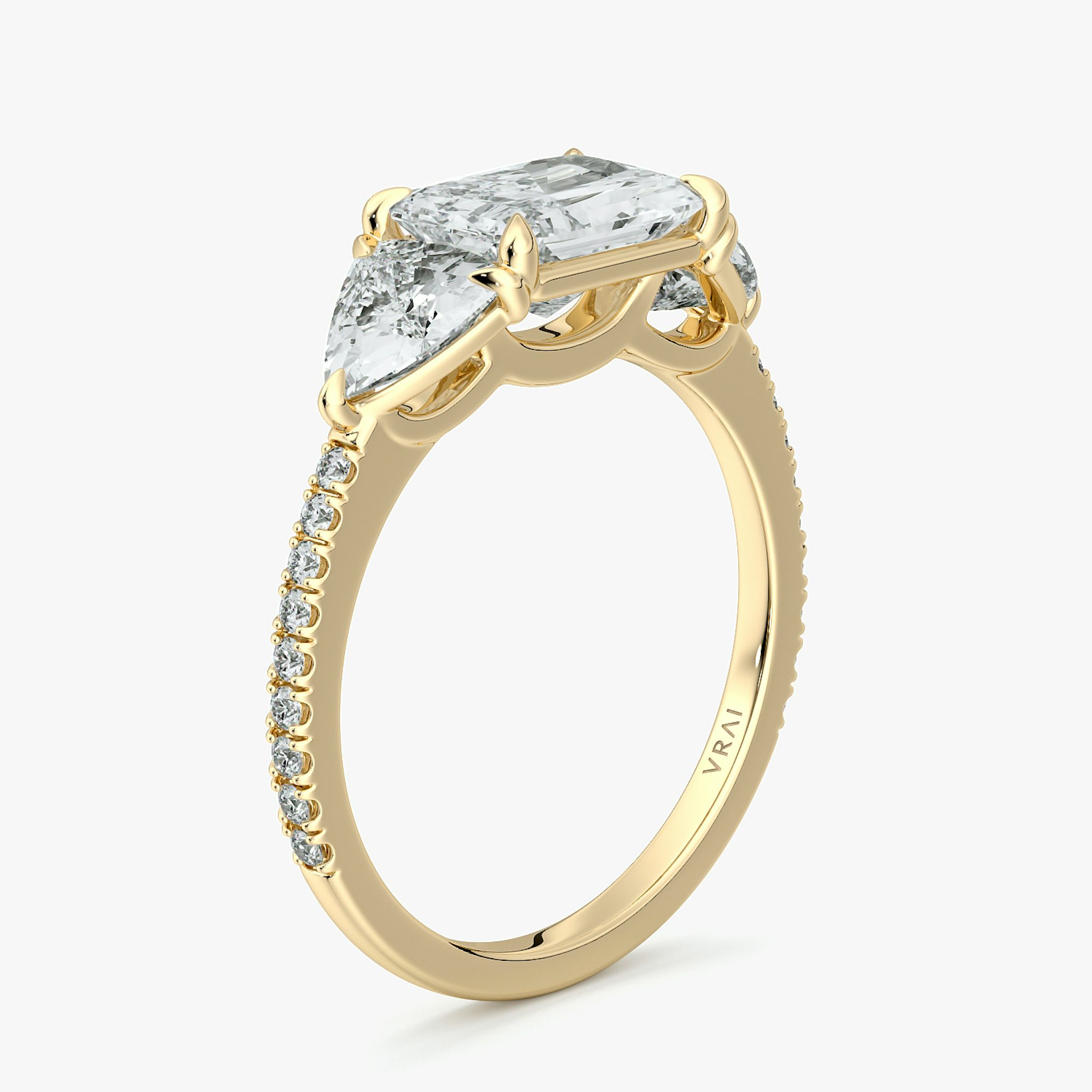 The Three Stone | Radiant | 18k | Yellow Gold | bandAccent: Pavé | diamondOrientation: horizontal | sideStoneCarat: 0.50ct | sideStoneShape: Trillion | caratWeight: other