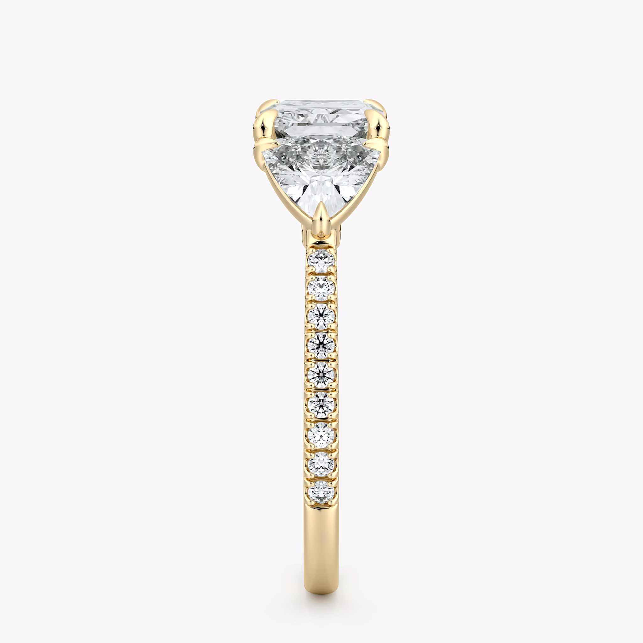 The Three Stone | Radiant | 18k | Yellow Gold | bandAccent: Pavé | diamondOrientation: horizontal | sideStoneCarat: 0.50ct | sideStoneShape: Trillion | caratWeight: other