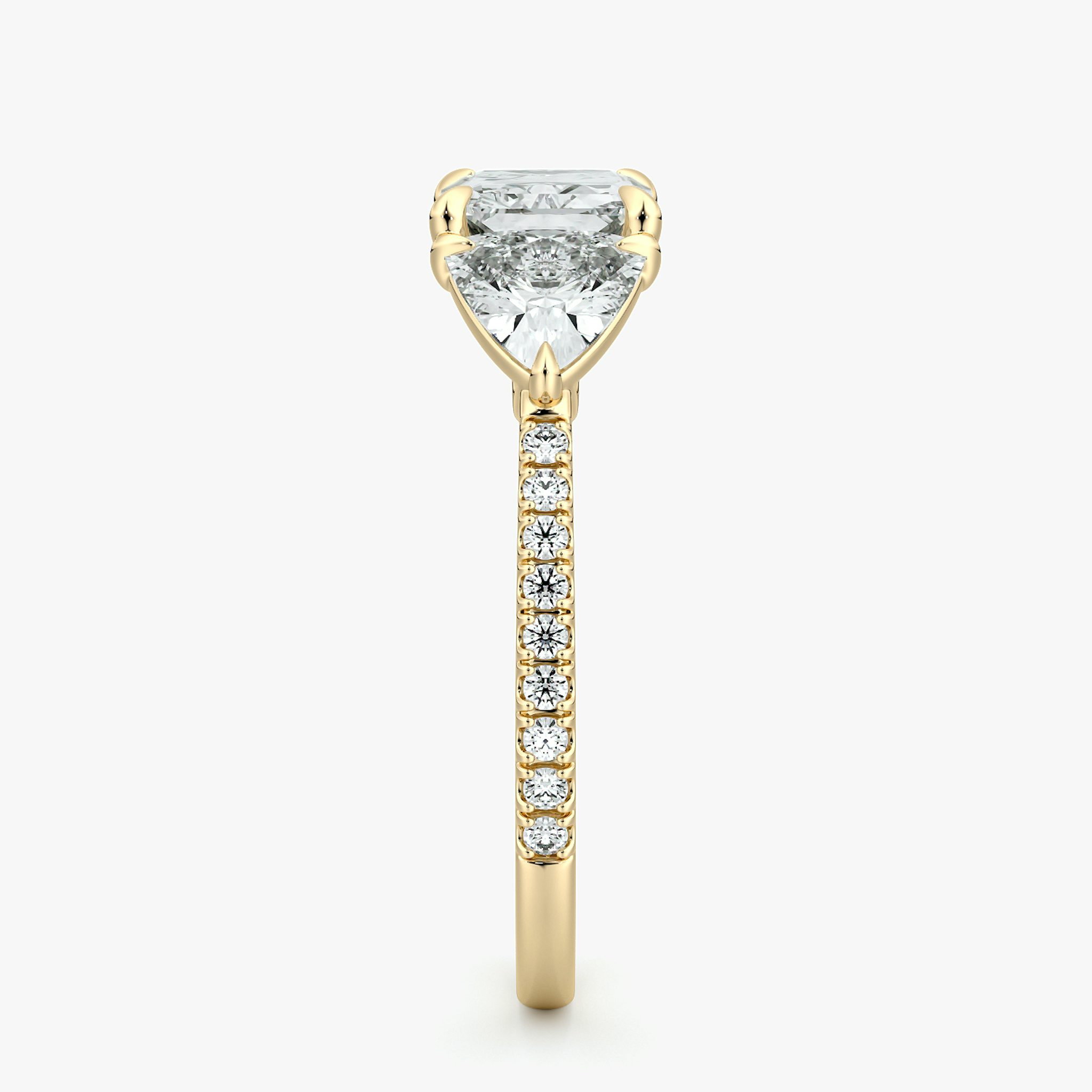 The Three Stone | Radiant | 18k | Yellow Gold | bandAccent: Pavé | diamondOrientation: horizontal | sideStoneCarat: 0.50ct | sideStoneShape: Trillion | caratWeight: other