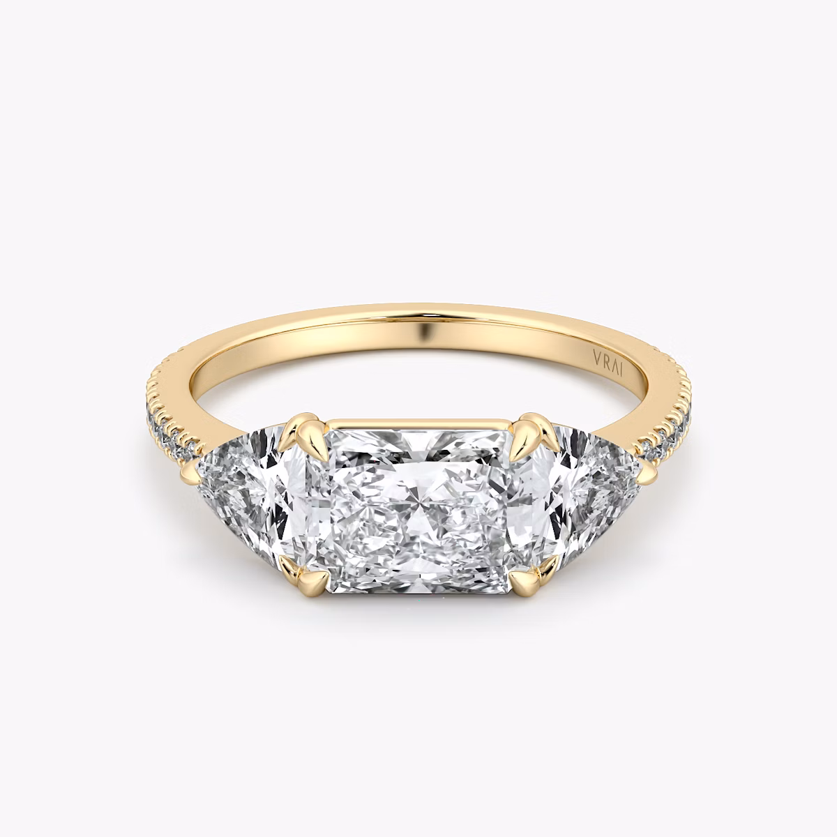 The Three Stone | Radiant | 18k | Yellow Gold | bandAccent: Pavé | diamondOrientation: horizontal | sideStoneCarat: 0.50ct | sideStoneShape: Trillion | caratWeight: other