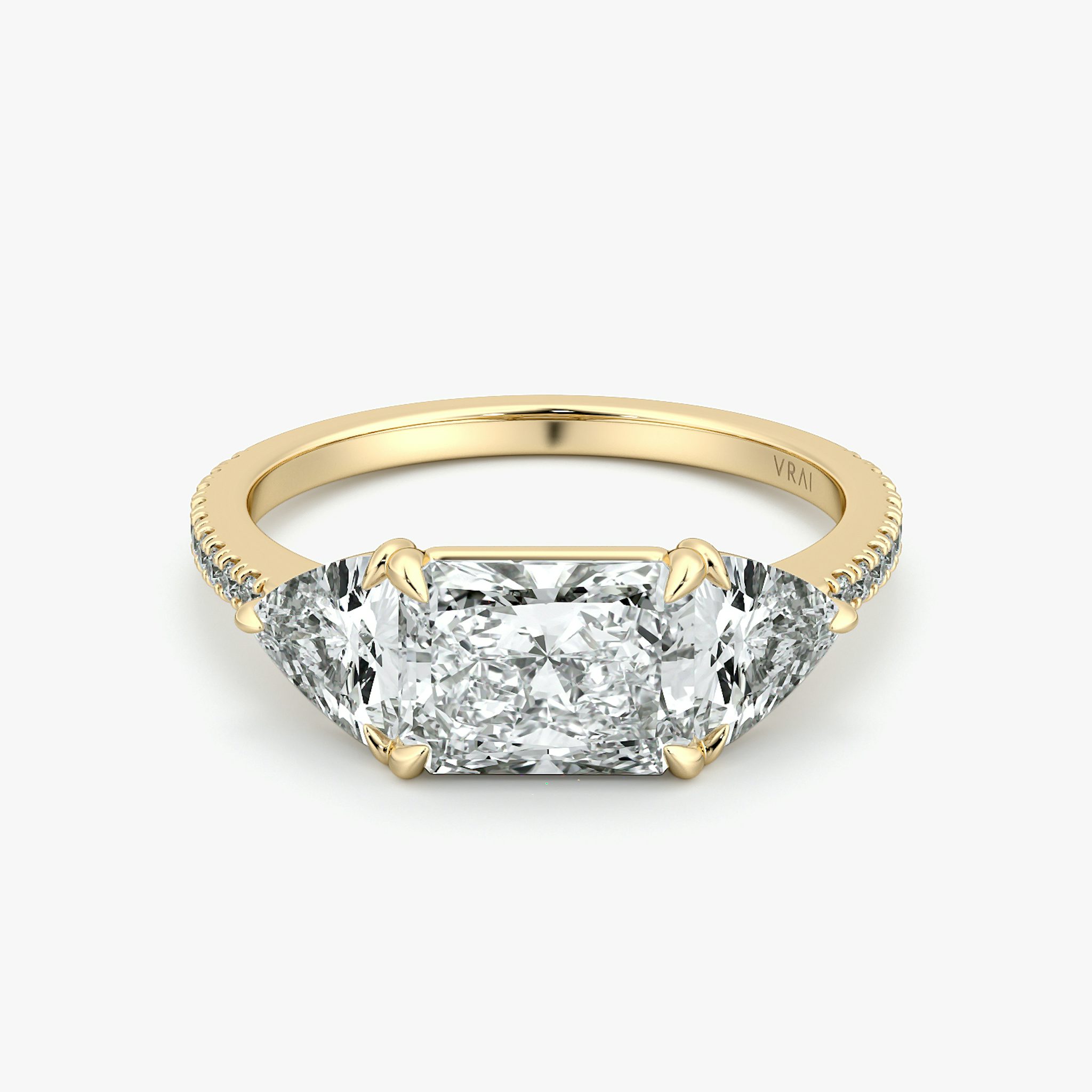 The Three Stone | Radiant | 18k | Yellow Gold | bandAccent: Pavé | diamondOrientation: horizontal | sideStoneCarat: 0.50ct | sideStoneShape: Trillion | caratWeight: other