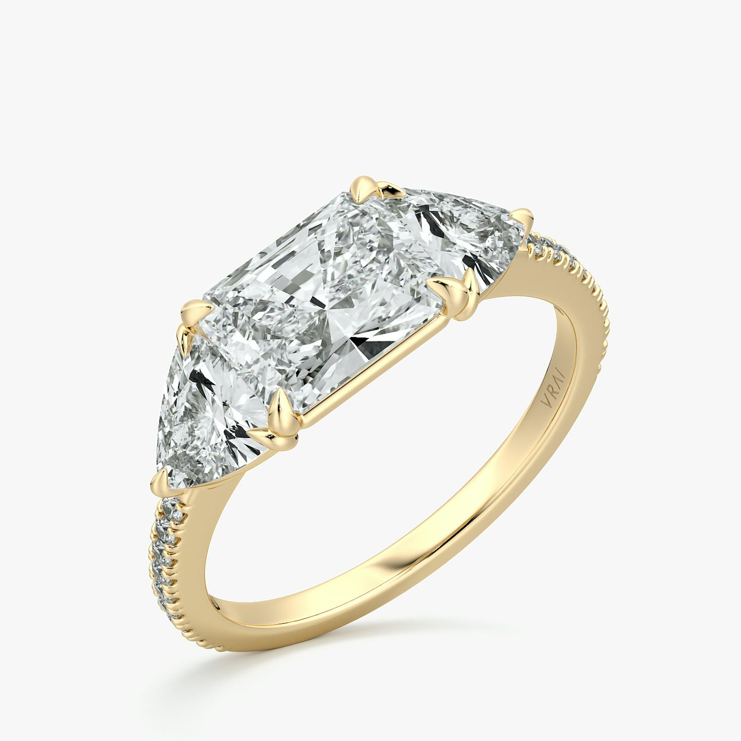 The Three Stone | Radiant | 18k | Yellow Gold | bandAccent: Pavé | diamondOrientation: horizontal | sideStoneCarat: 0.50ct | sideStoneShape: Trillion | caratWeight: other