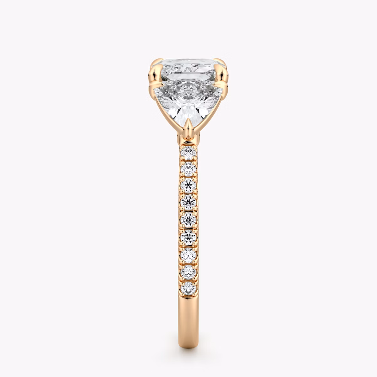 The Three Stone | Radiant | 14k | Rose Gold | bandAccent: Pavé | diamondOrientation: horizontal | sideStoneCarat: 0.50ct | sideStoneShape: Trillion | caratWeight: other