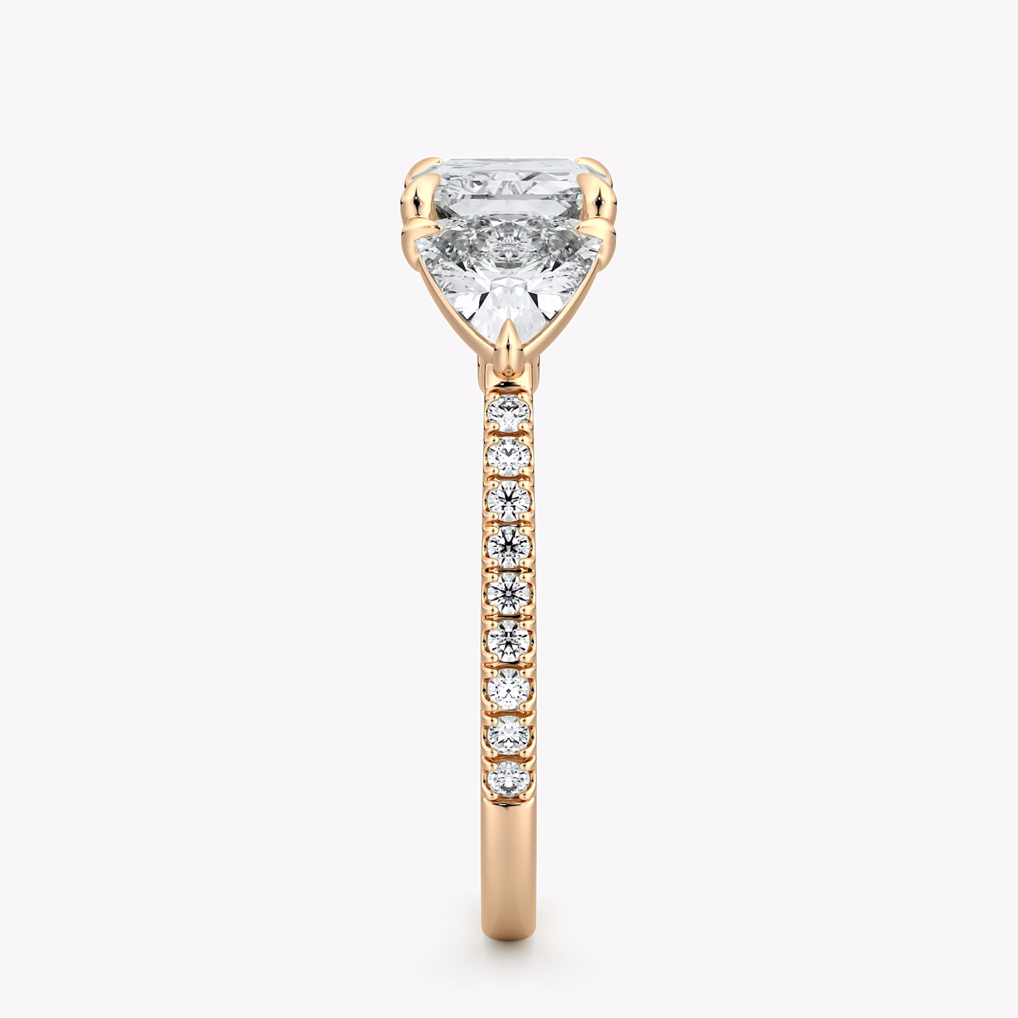 The Three Stone | Radiant | 14k | Rose Gold | bandAccent: Pavé | diamondOrientation: horizontal | sideStoneCarat: 0.50ct | sideStoneShape: Trillion | caratWeight: other