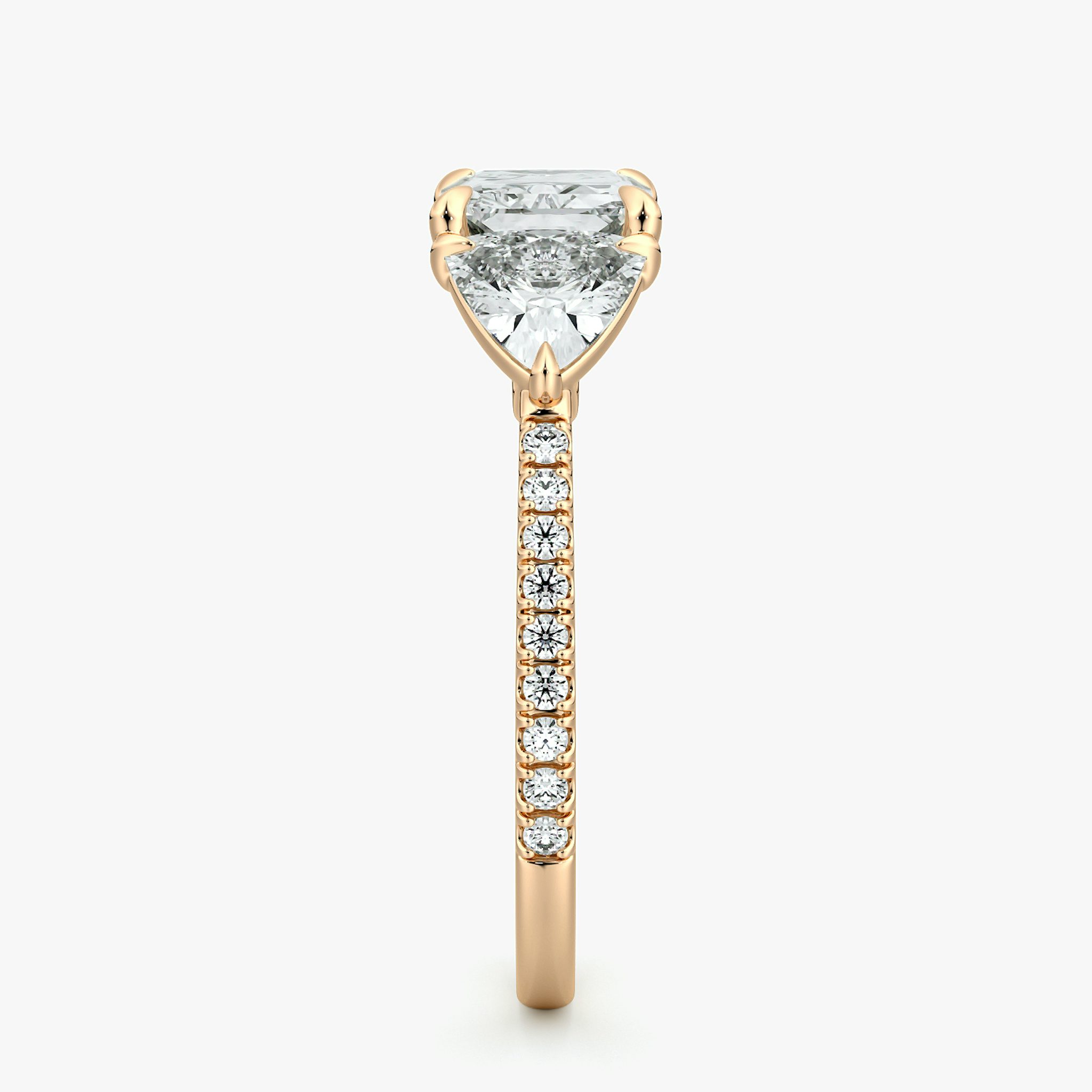 The Three Stone | Radiant | 14k | Rose Gold | bandAccent: Pavé | diamondOrientation: horizontal | sideStoneCarat: 0.50ct | sideStoneShape: Trillion | caratWeight: other