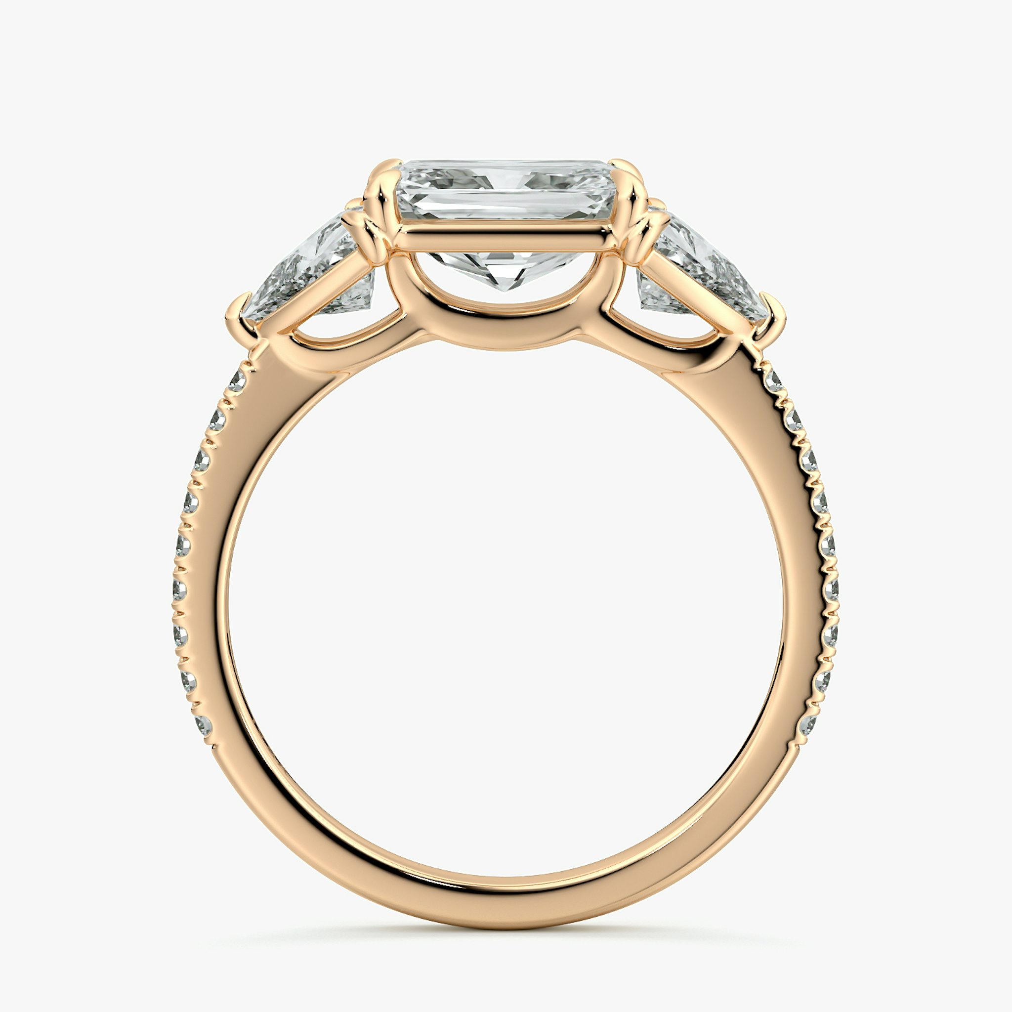 The Three Stone | Radiant | 14k | Rose Gold | bandAccent: Pavé | diamondOrientation: horizontal | sideStoneCarat: 0.50ct | sideStoneShape: Trillion | caratWeight: other