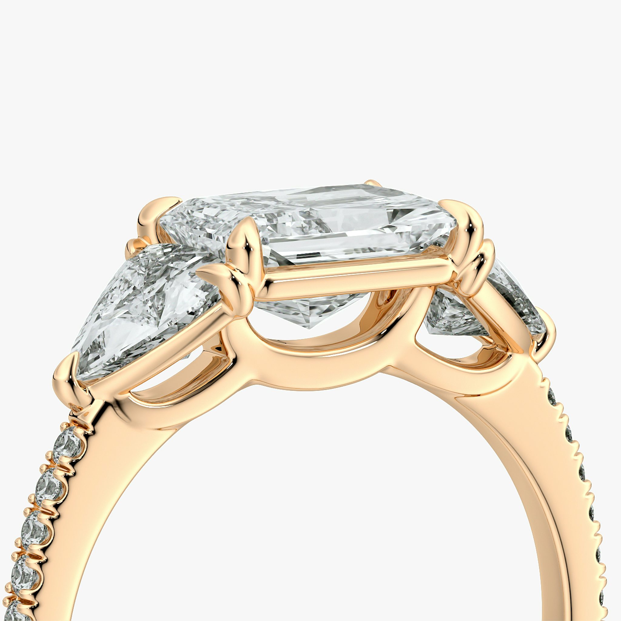 The Three Stone | Radiant | 14k | Rose Gold | bandAccent: Pavé | diamondOrientation: horizontal | sideStoneCarat: 0.50ct | sideStoneShape: Trillion | caratWeight: other