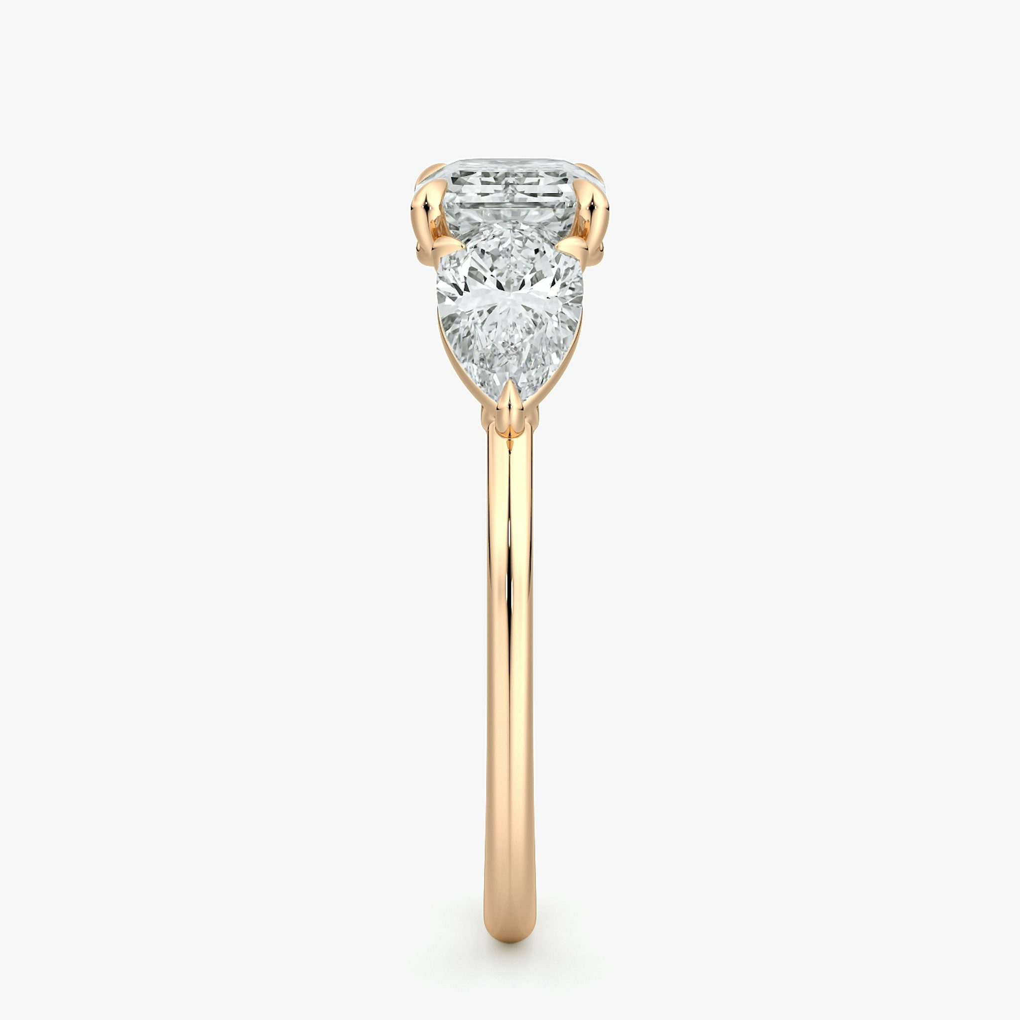 The Three Stone | Emerald | 14k | Rose Gold | bandAccent: Plain | diamondOrientation: horizontal | sideStoneCarat: 0.50ct | sideStoneShape: Pear | caratWeight: other