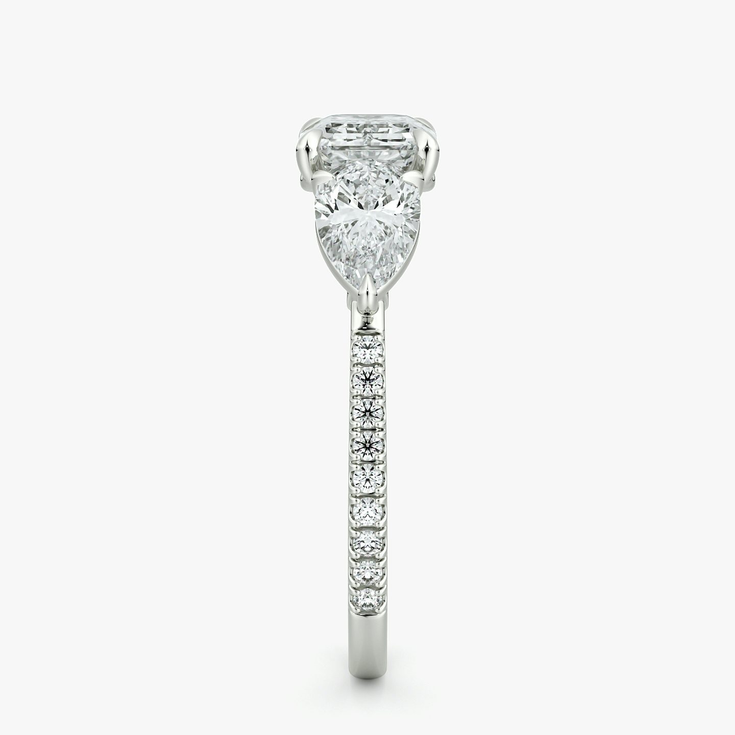 The Three Stone | Emerald | 18k | White Gold | bandAccent: Pavé | diamondOrientation: horizontal | sideStoneCarat: 0.50ct | sideStoneShape: Pear | caratWeight: other