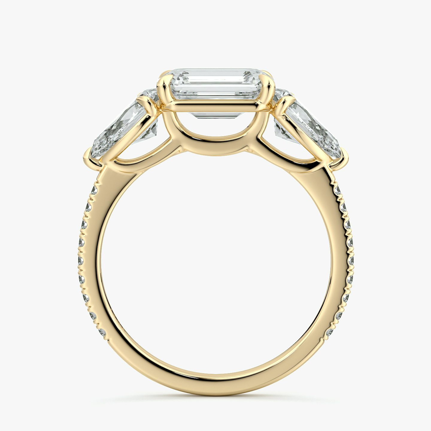 The Three Stone | Emerald | 18k | Yellow Gold | bandAccent: Pavé | diamondOrientation: horizontal | sideStoneCarat: 0.50ct | sideStoneShape: Pear | caratWeight: other