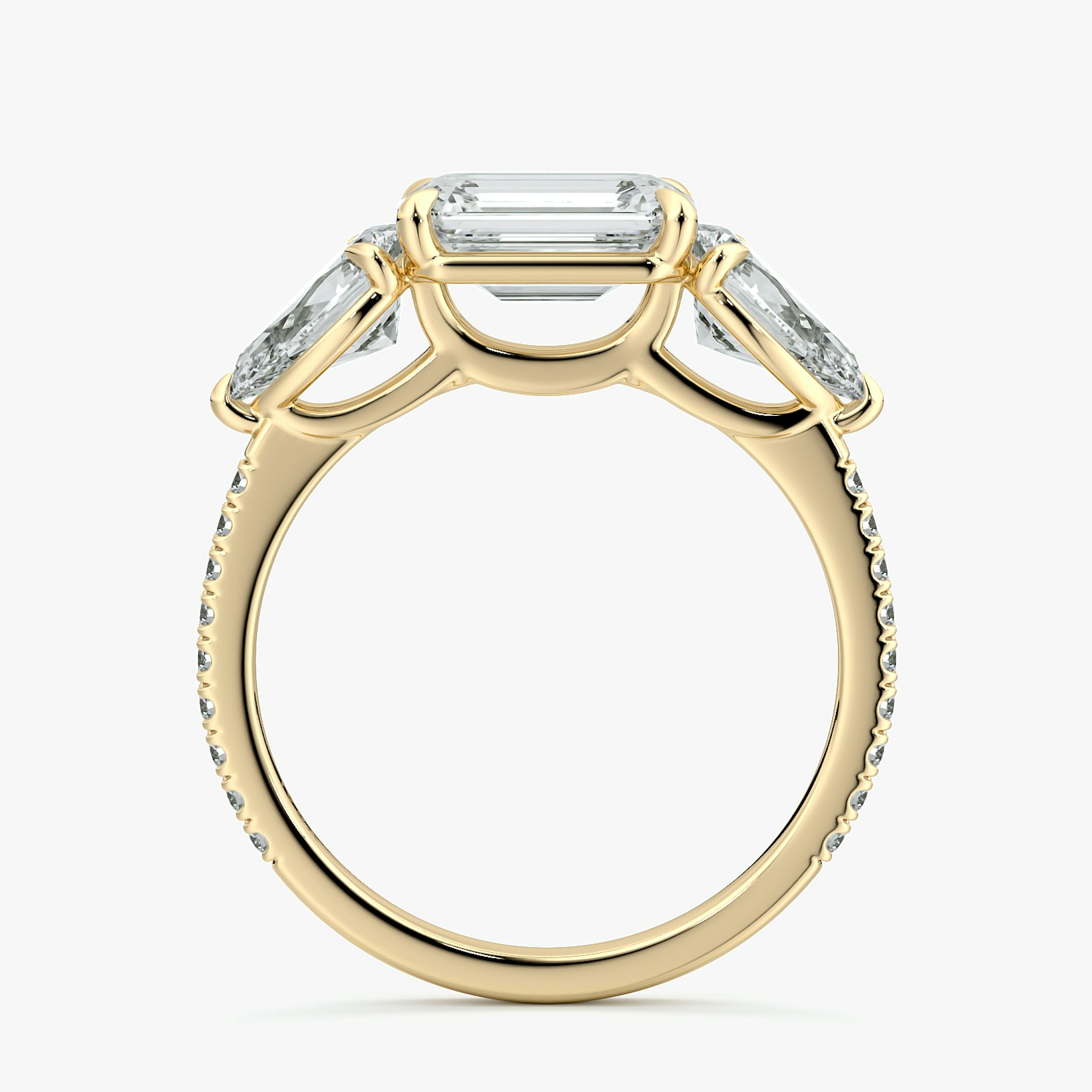 The Three Stone | Emerald | 18k | Yellow Gold | bandAccent: Pavé | diamondOrientation: horizontal | sideStoneCarat: 0.50ct | sideStoneShape: Pear | caratWeight: other