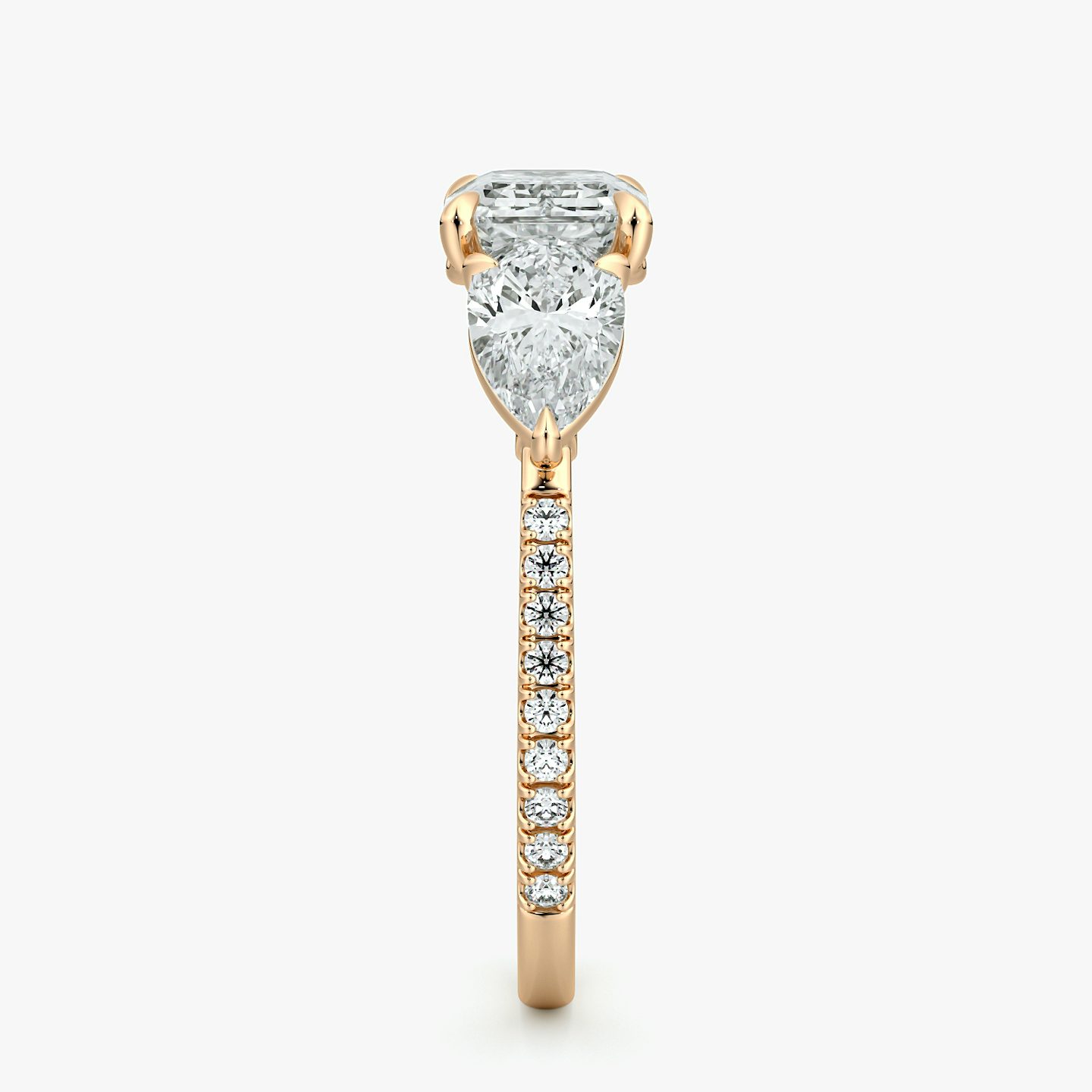 The Three Stone | Emerald | 14k | Rose Gold | bandAccent: Pavé | diamondOrientation: horizontal | sideStoneCarat: 0.50ct | sideStoneShape: Pear | caratWeight: other