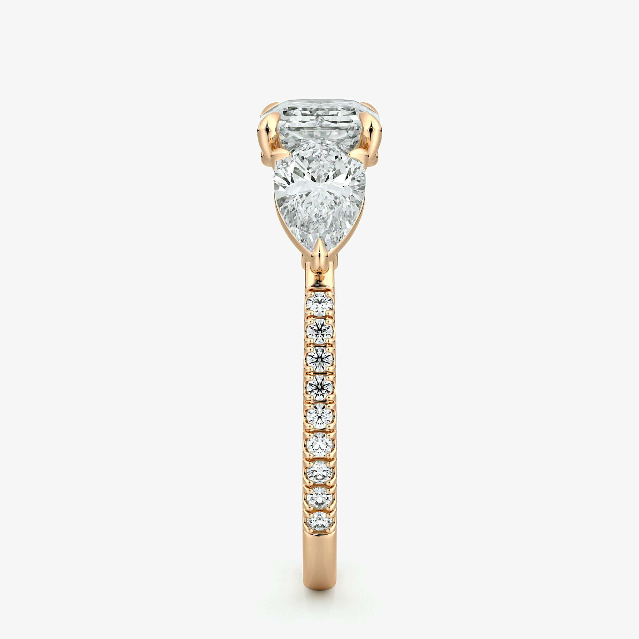 The Three Stone | Emerald | 14k | Rose Gold | bandAccent: Pavé | diamondOrientation: horizontal | sideStoneCarat: 0.50ct | sideStoneShape: Pear | caratWeight: other