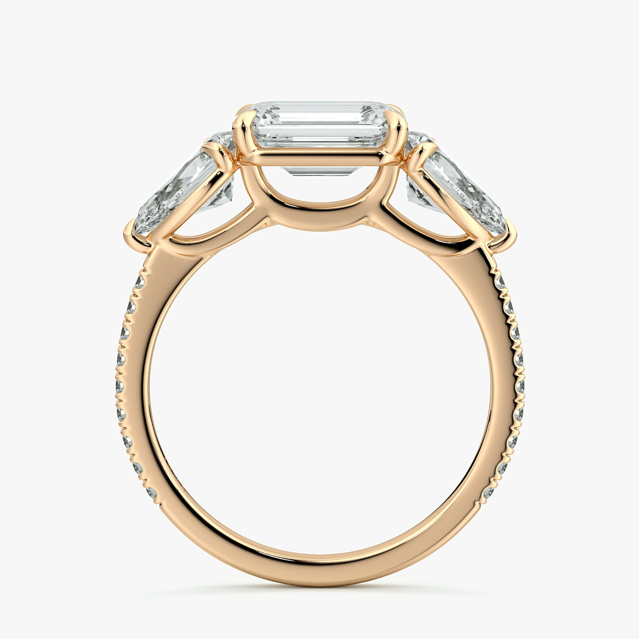 The Three Stone | Emerald | 14k | Rose Gold | bandAccent: Pavé | diamondOrientation: horizontal | sideStoneCarat: 0.50ct | sideStoneShape: Pear | caratWeight: other