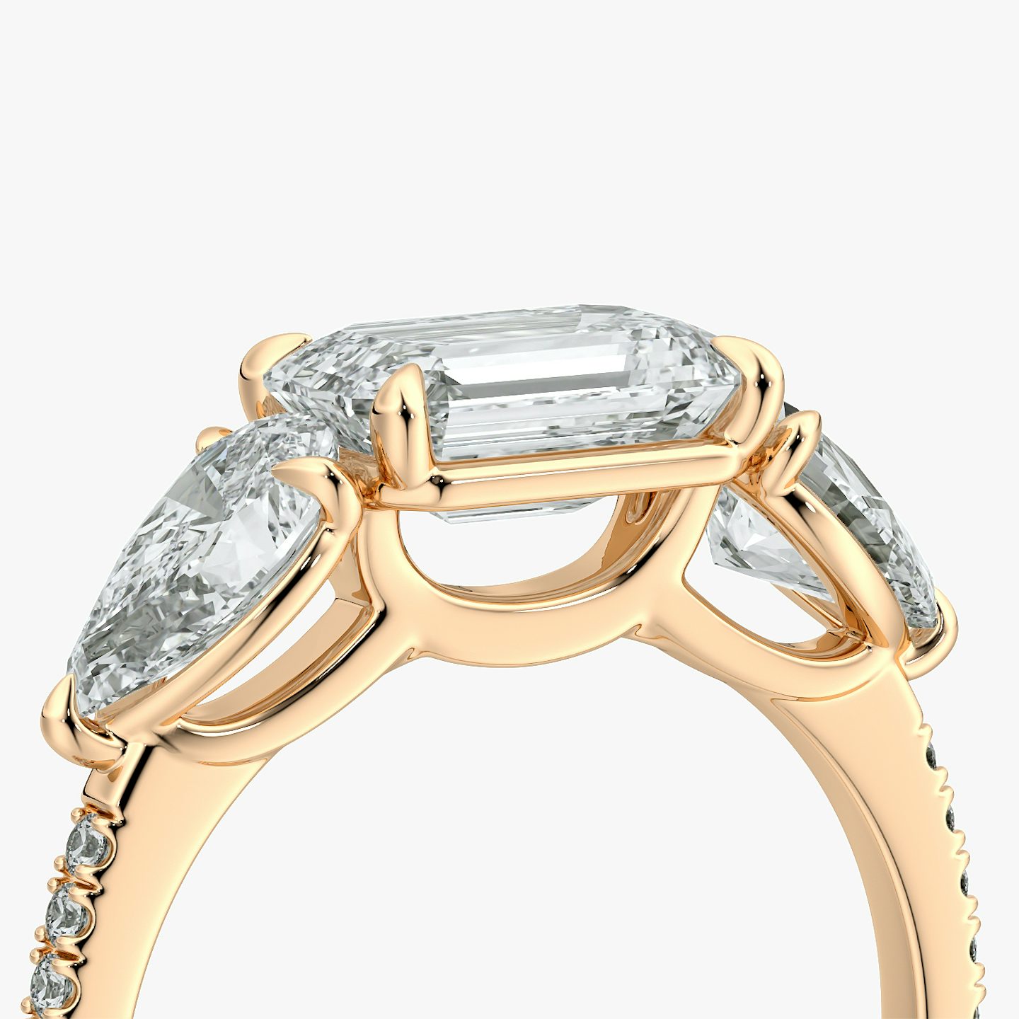 The Three Stone | Emerald | 14k | Rose Gold | bandAccent: Pavé | diamondOrientation: horizontal | sideStoneCarat: 0.50ct | sideStoneShape: Pear | caratWeight: other