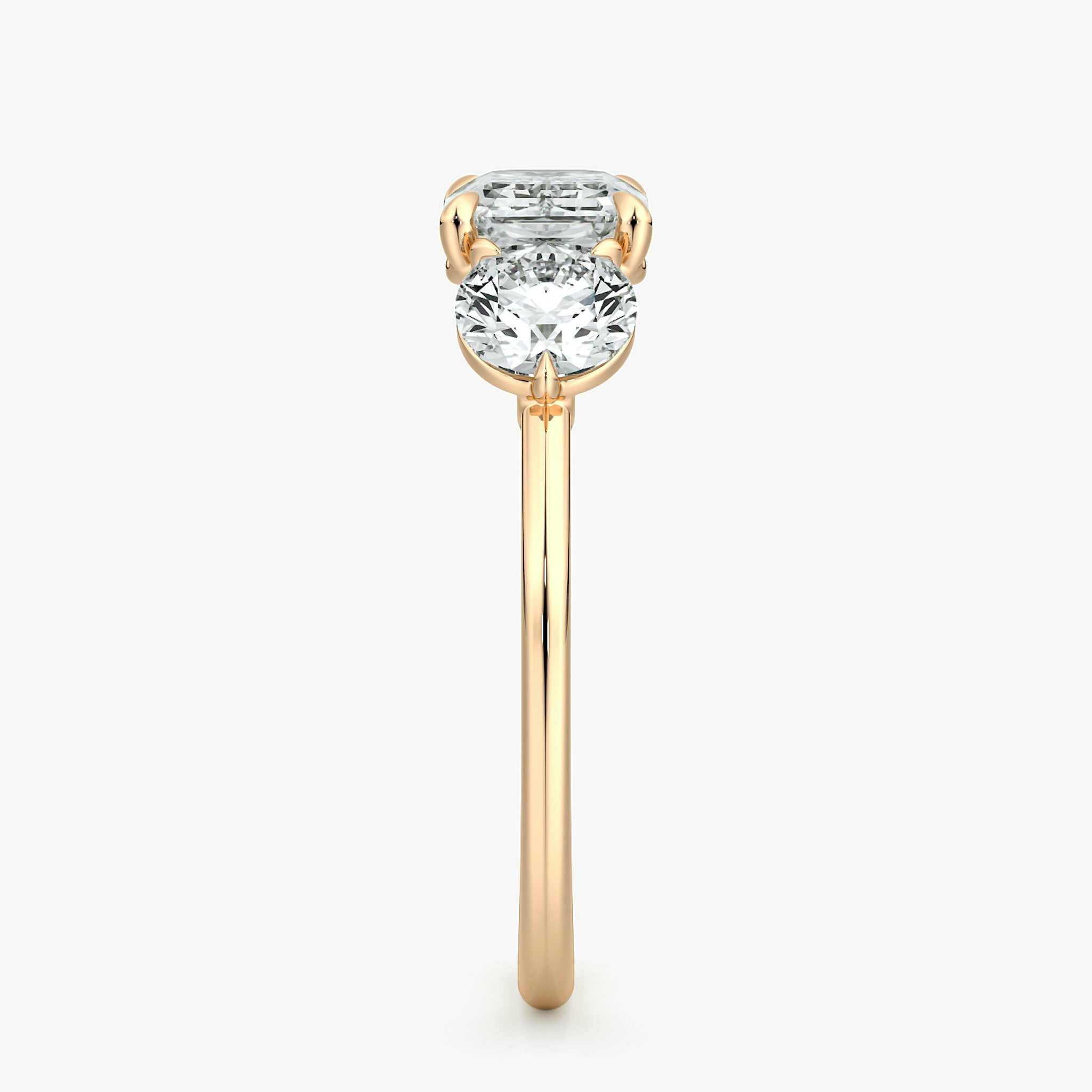 The Three Stone | Emerald | 14k | Rose Gold | bandAccent: Plain | diamondOrientation: horizontal | sideStoneCarat: 0.50ct | sideStoneShape: Round Brilliant | caratWeight: other