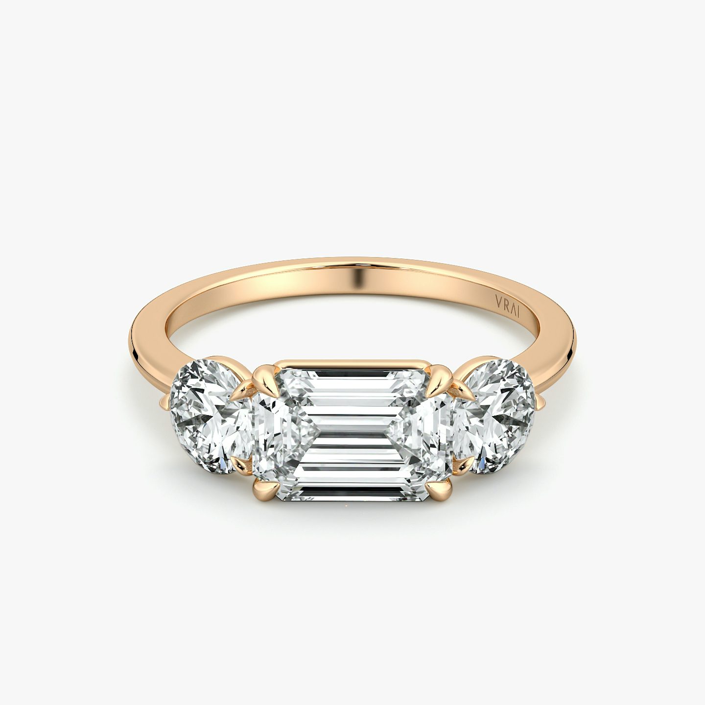 The Three Stone | Emerald | 14k | Rose Gold | bandAccent: Plain | diamondOrientation: horizontal | sideStoneCarat: 0.50ct | sideStoneShape: Round Brilliant | caratWeight: other
