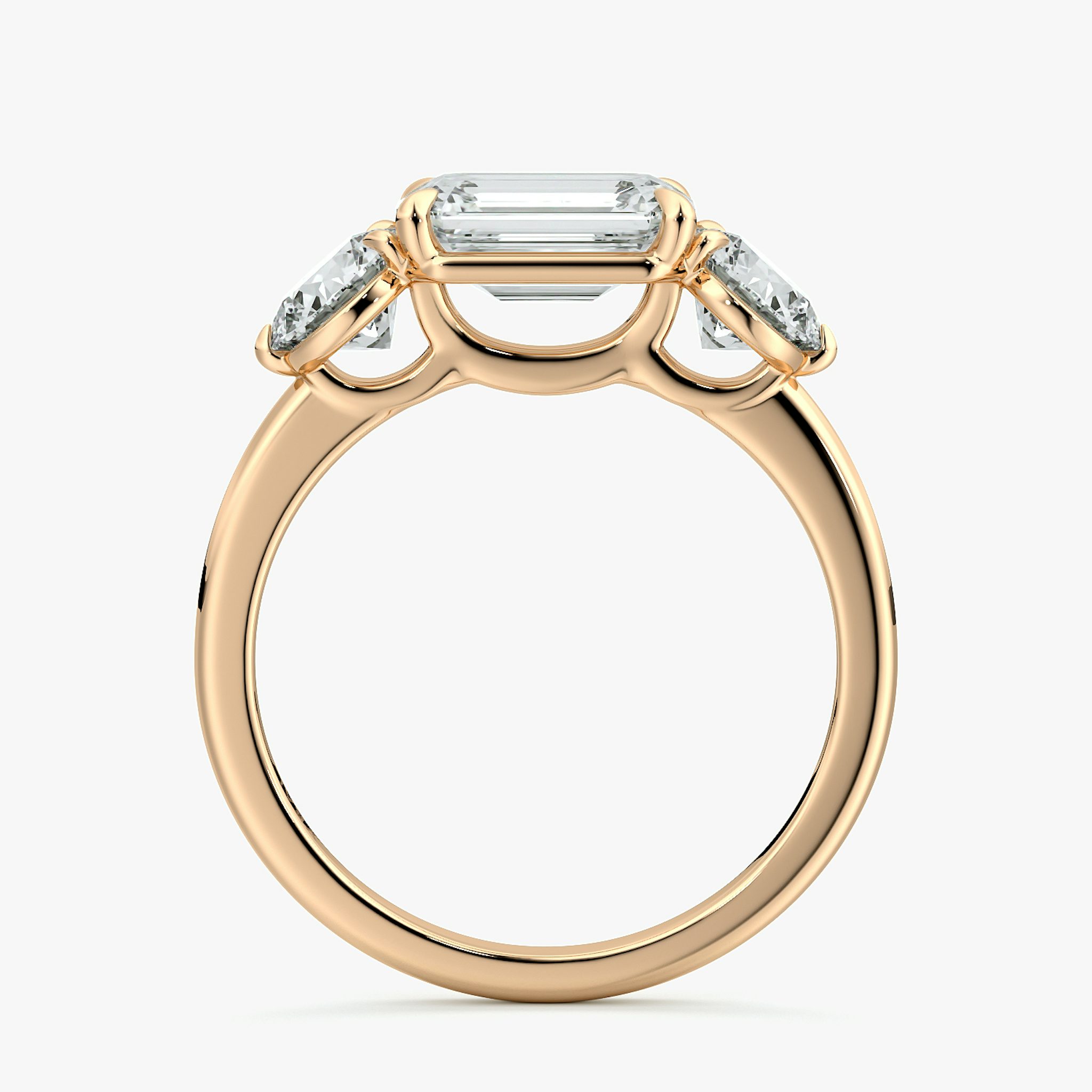 The Three Stone | Emerald | 14k | Rose Gold | bandAccent: Plain | diamondOrientation: horizontal | sideStoneCarat: 0.50ct | sideStoneShape: Round Brilliant | caratWeight: other