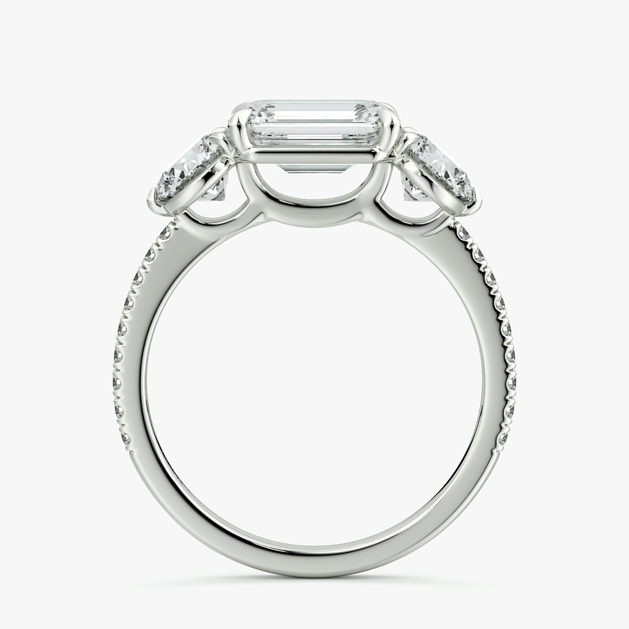 The Three Stone | Emerald | 18k | White Gold | bandAccent: Pavé | diamondOrientation: horizontal | sideStoneCarat: 0.50ct | sideStoneShape: Round Brilliant | caratWeight: other