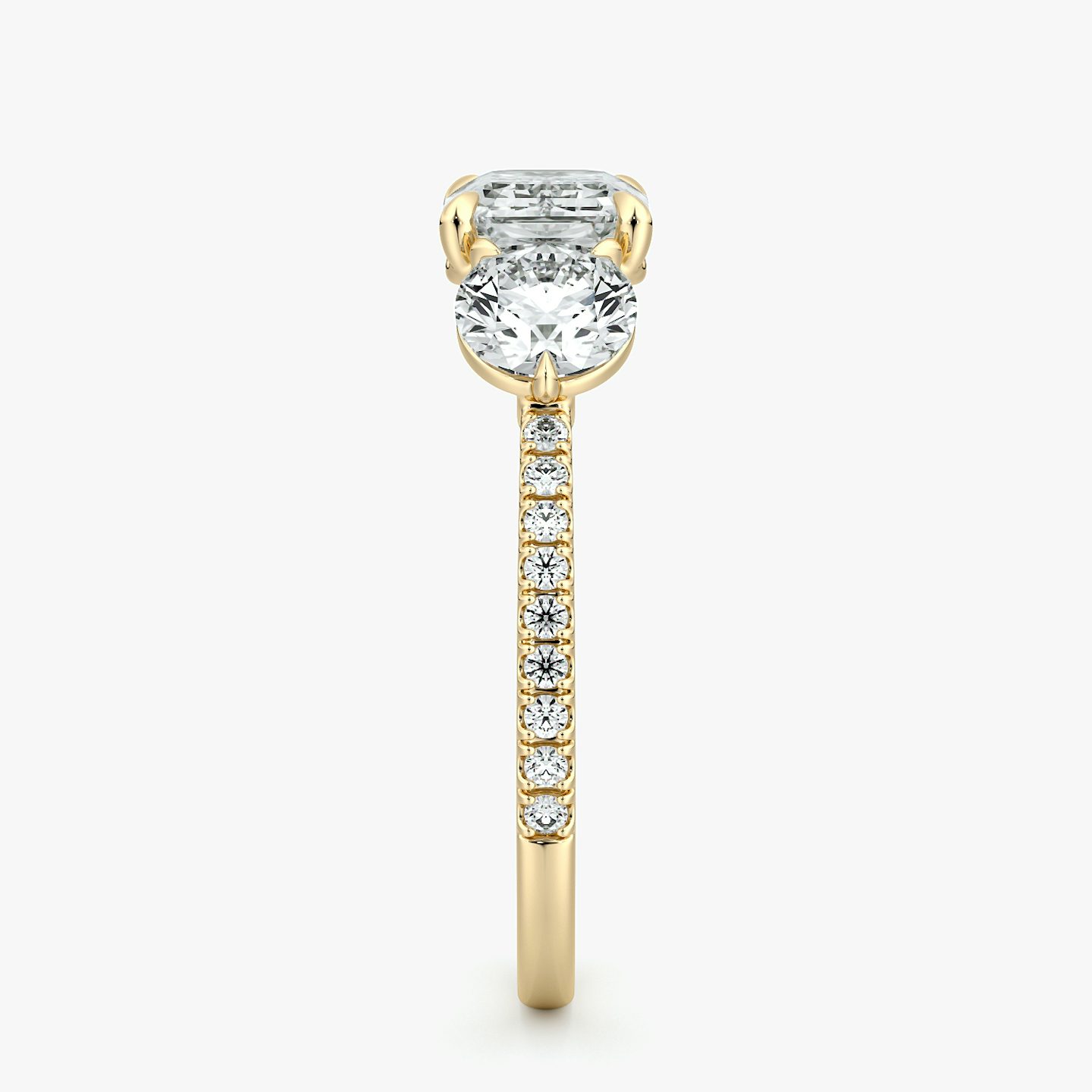 The Three Stone | Emerald | 18k | Yellow Gold | bandAccent: Pavé | diamondOrientation: horizontal | sideStoneCarat: 0.50ct | sideStoneShape: Round Brilliant | caratWeight: other