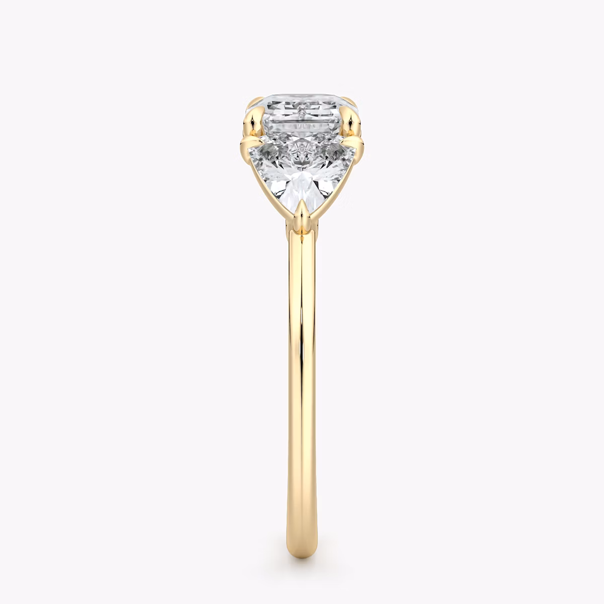 The Three Stone | Emerald | 18k | Yellow Gold | bandAccent: Plain | diamondOrientation: horizontal | sideStoneCarat: 0.50ct | sideStoneShape: Trillion | caratWeight: other