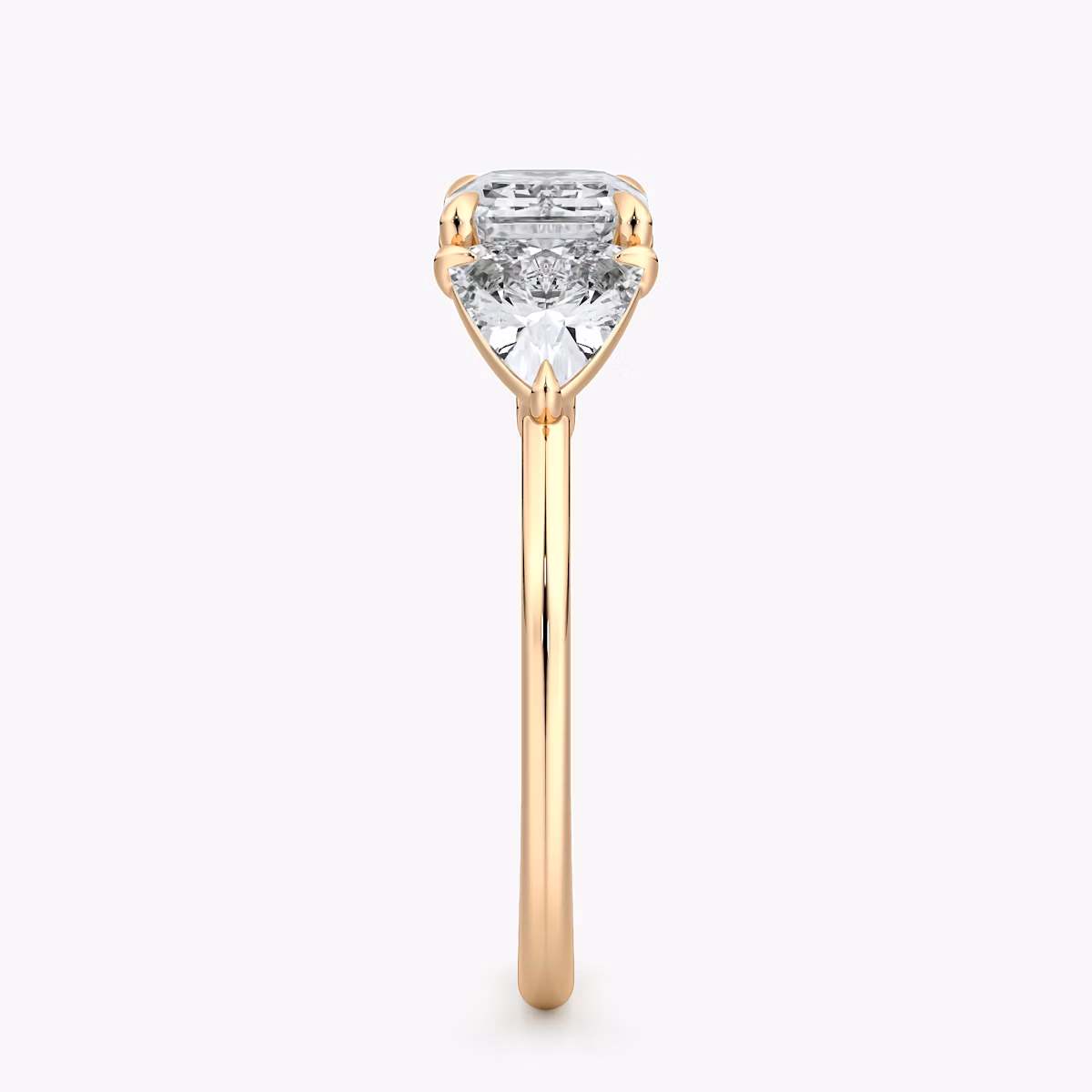 The Three Stone | Emerald | 14k | Rose Gold | bandAccent: Plain | diamondOrientation: horizontal | sideStoneCarat: 0.50ct | sideStoneShape: Trillion | caratWeight: other