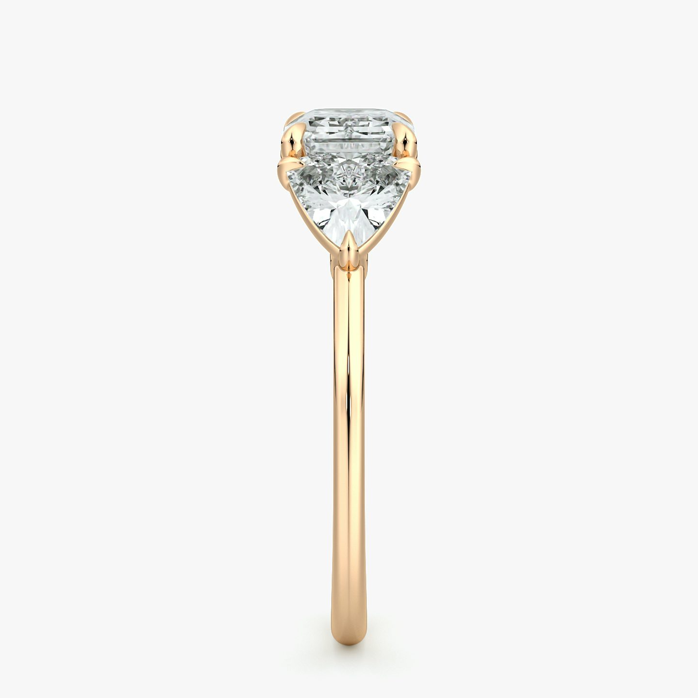 The Three Stone | Emerald | 14k | Rose Gold | bandAccent: Plain | diamondOrientation: horizontal | sideStoneCarat: 0.50ct | sideStoneShape: Trillion | caratWeight: other