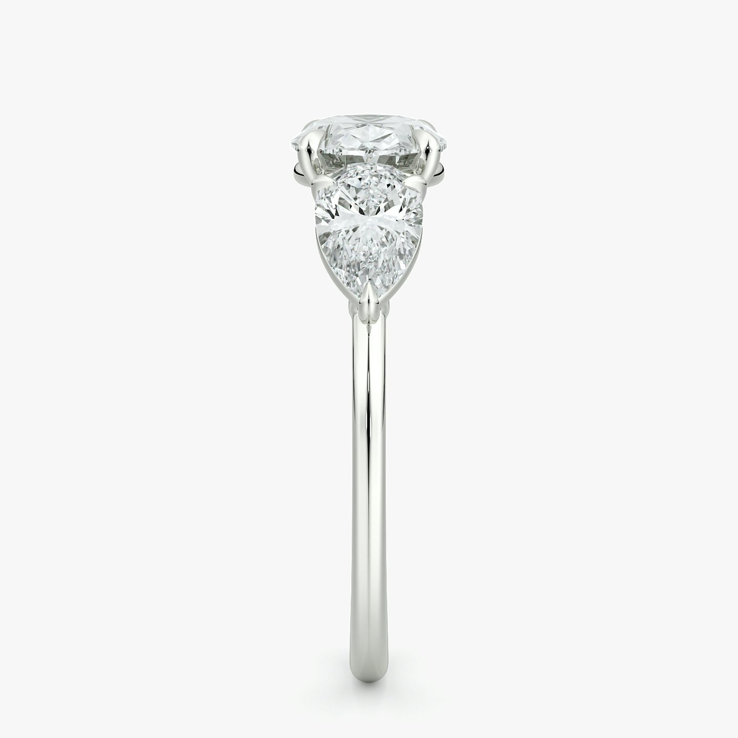 The Three Stone | Oval | Platinum | bandAccent: Plain | diamondOrientation: horizontal | sideStoneCarat: 0.50ct | sideStoneShape: Pear | caratWeight: other