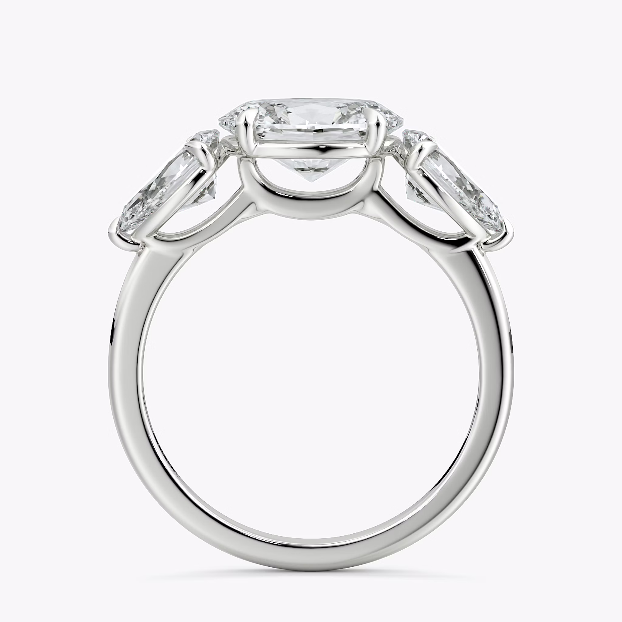 The Three Stone | Oval | 18k | White Gold | bandAccent: Plain | diamondOrientation: horizontal | sideStoneCarat: 0.50ct | sideStoneShape: Pear | caratWeight: other