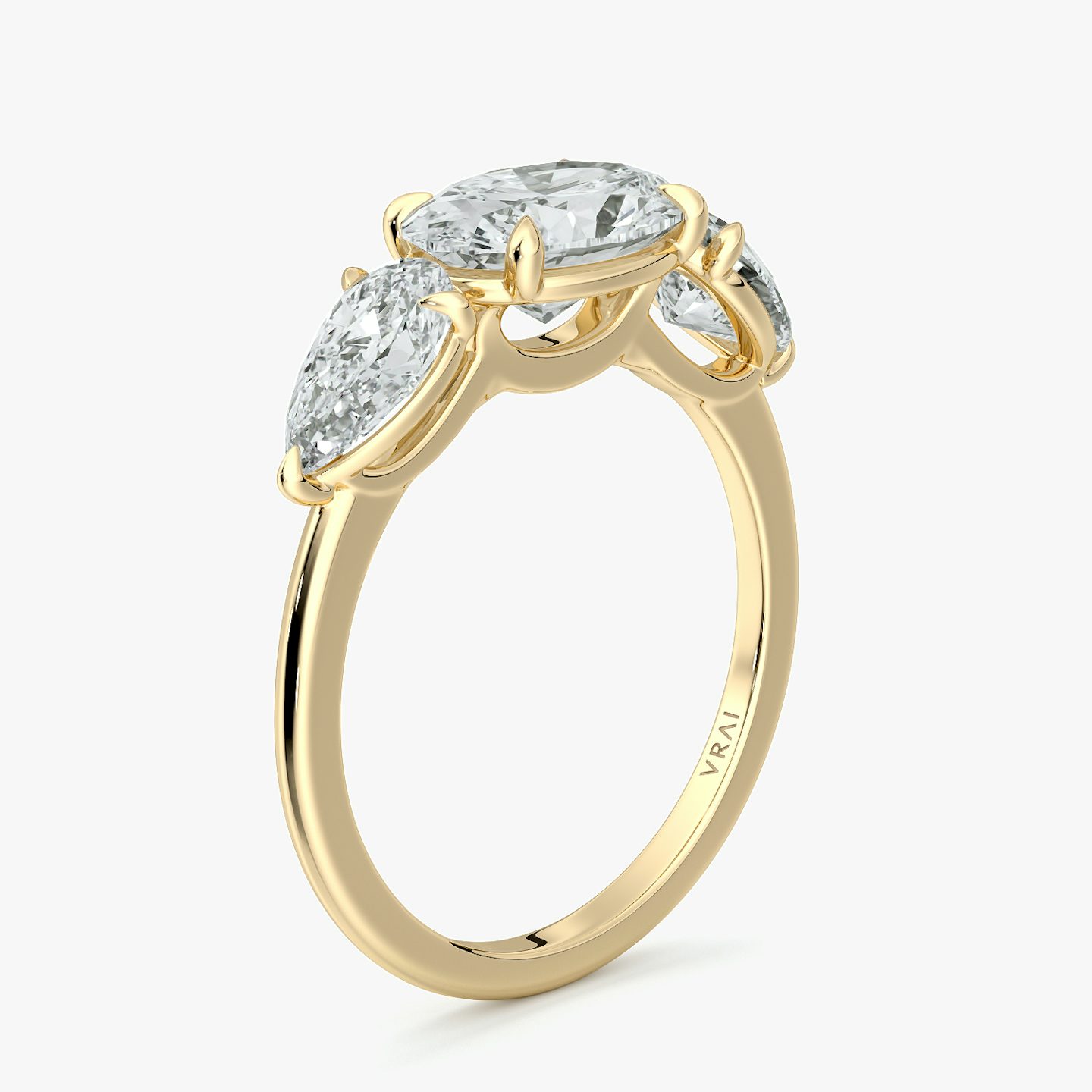 The Three Stone | Oval | 18k | Yellow Gold | bandAccent: Plain | diamondOrientation: horizontal | sideStoneCarat: 0.50ct | sideStoneShape: Pear | caratWeight: other